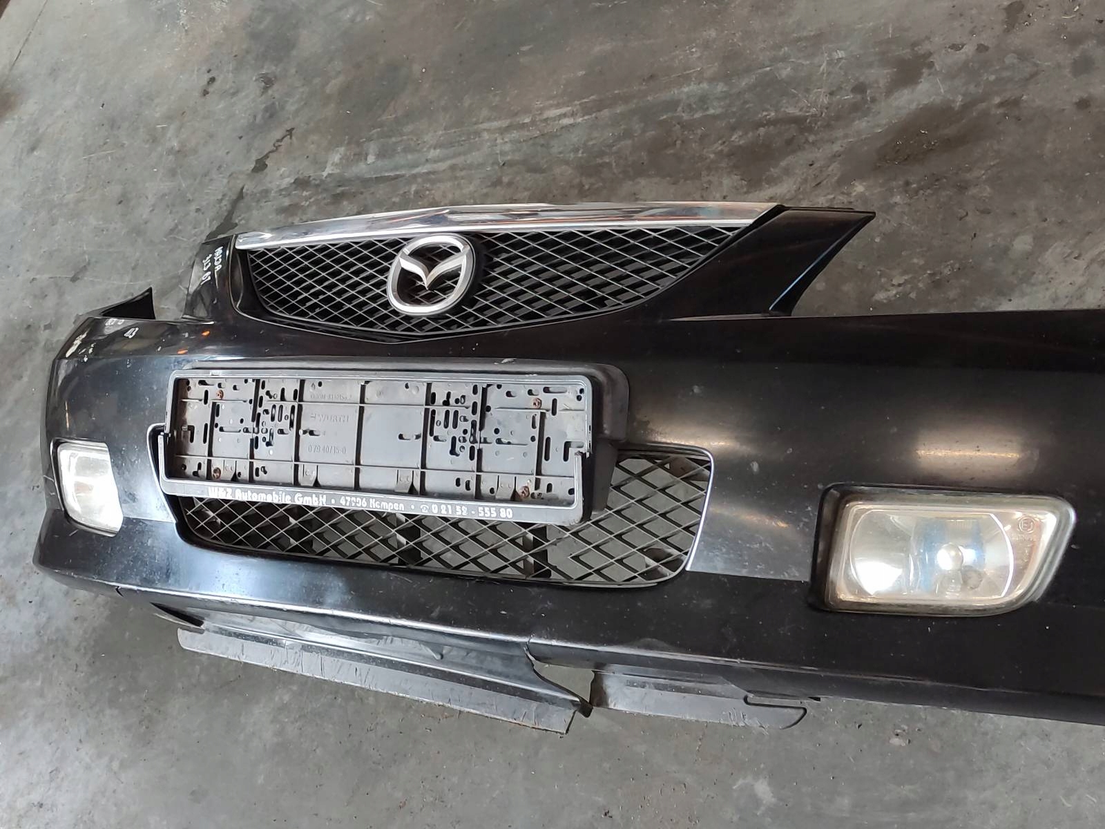 Stoßstange + Leuchte MAZDA 323 BJ