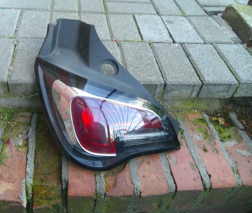 OPEL ADAM 12- LEWA TYLNA LAMPA ZWYKŁA ORYGINAŁ 366900804