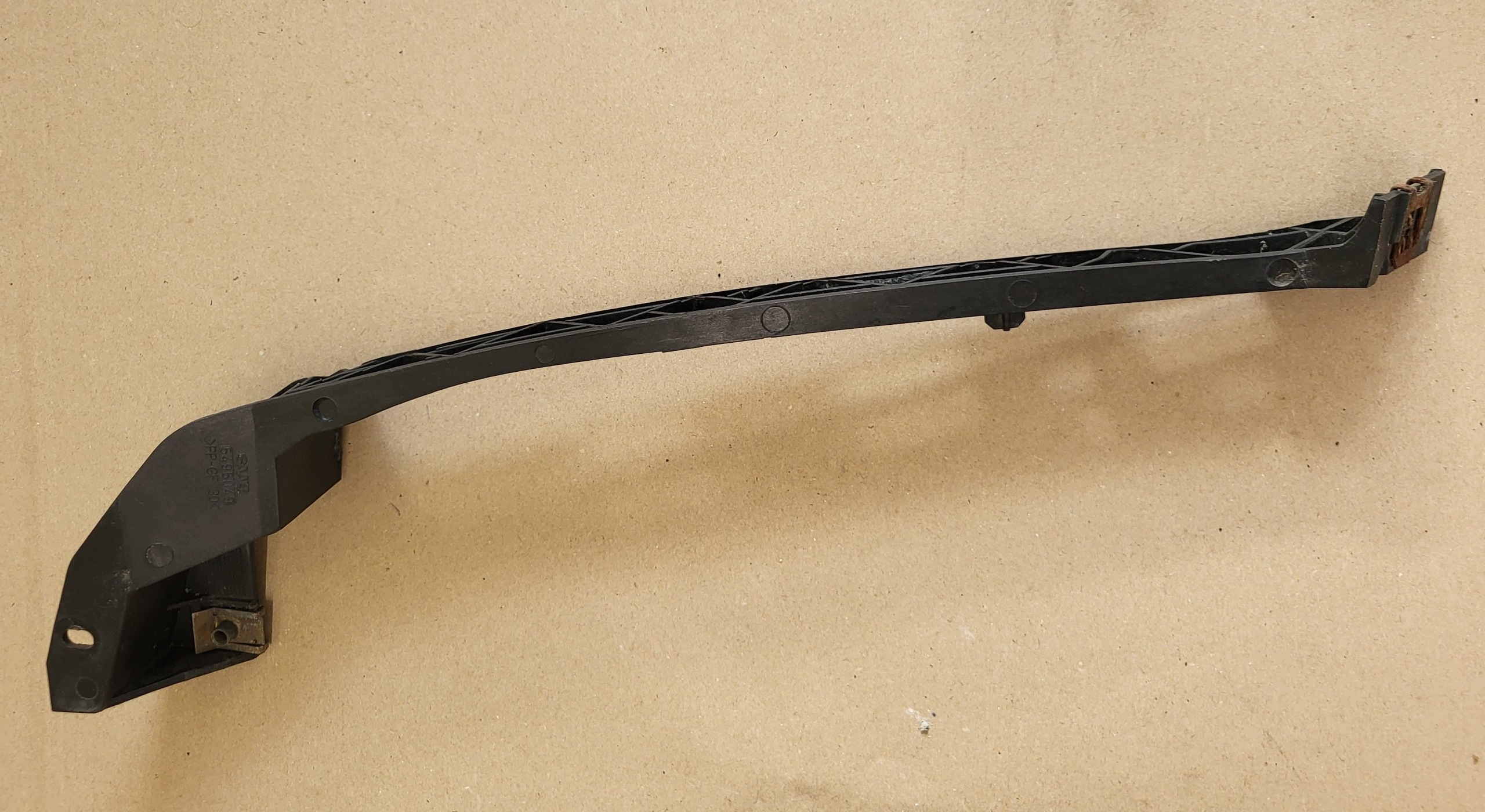 support holder of a bumper left front console SAAB 9-5 95 5495049 OE
