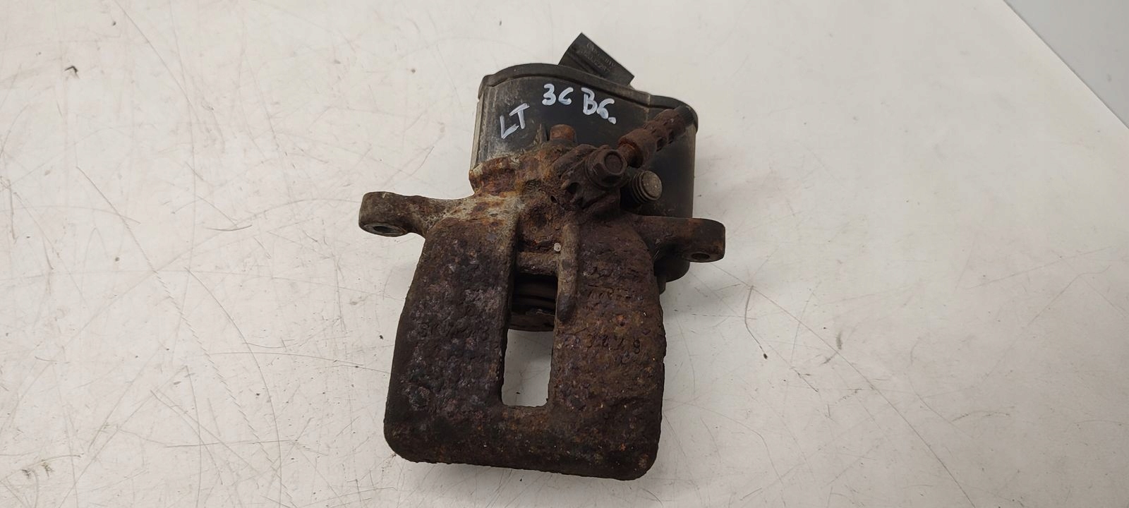 caliper rear part rear left VW Passat B6 2,0 TDI CR