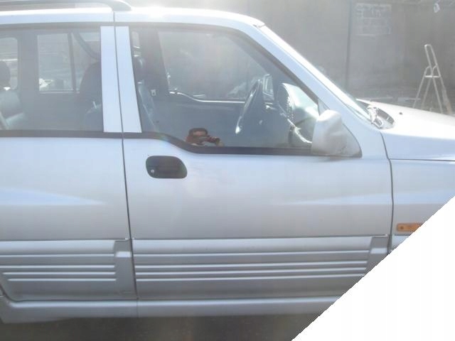 SSANGYONG MUSSO 96- ZAMEK PRAWY PRZEDNI