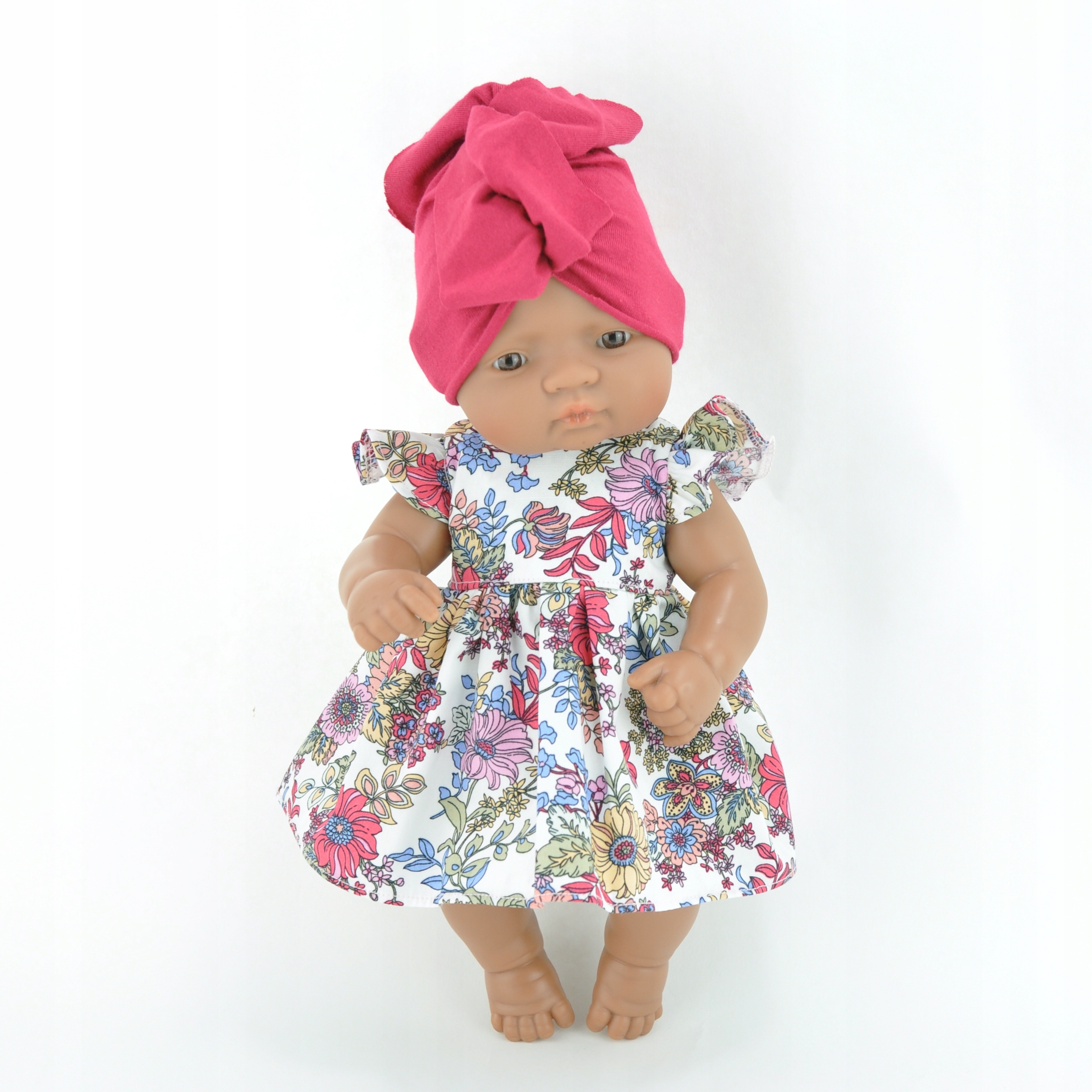 

Sukienka w kwiaty i turban dla lalki Miniland 32cm