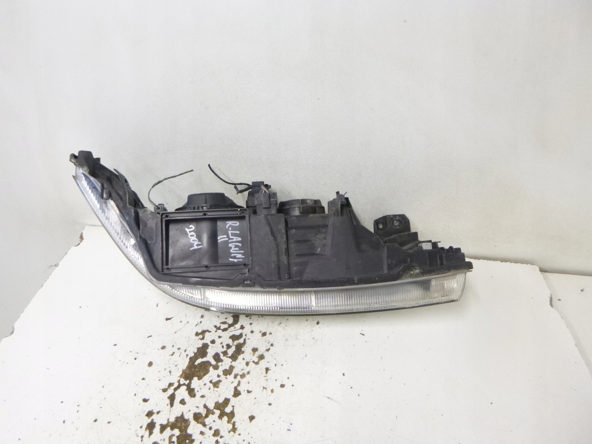 light front Renault Laguna II 2004r. 7701048927