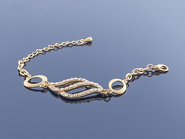 

Złota bransoletka Charms