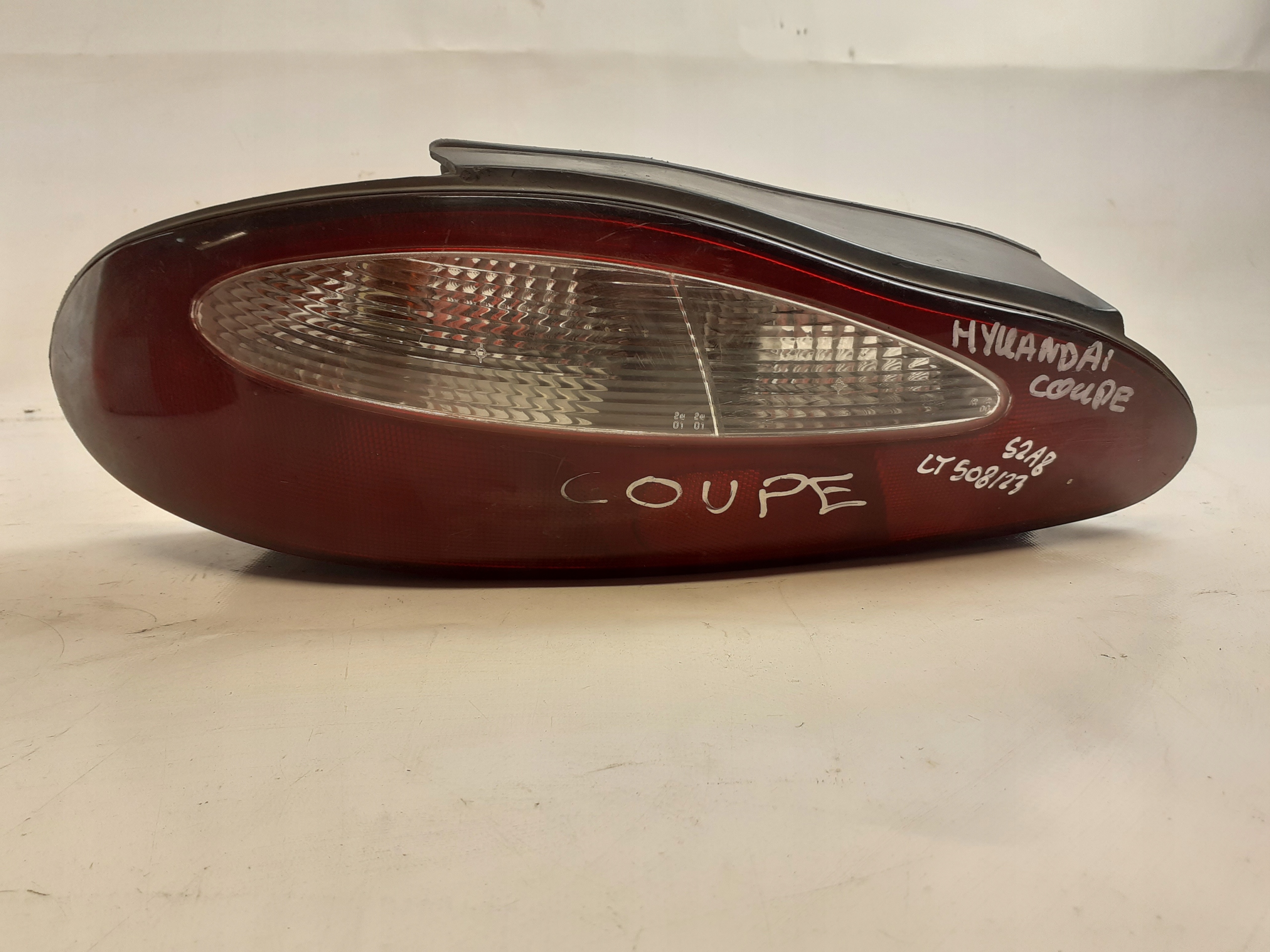Hyundai Coupe and light rear part right