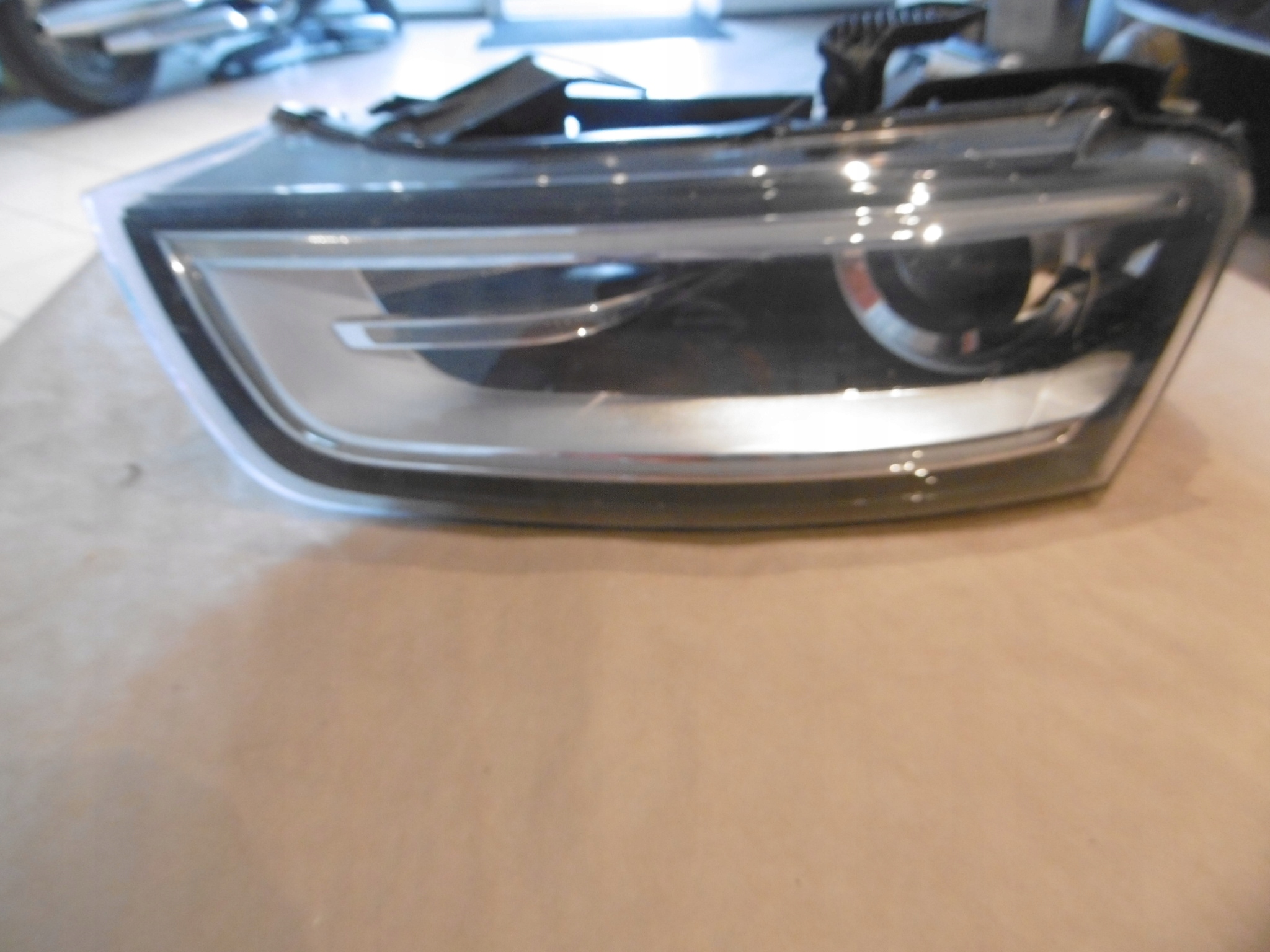 AUDI Q3 ФАРА КСЕНОН ЛІВА ПЕРЕД PRZEDNIAu0941005