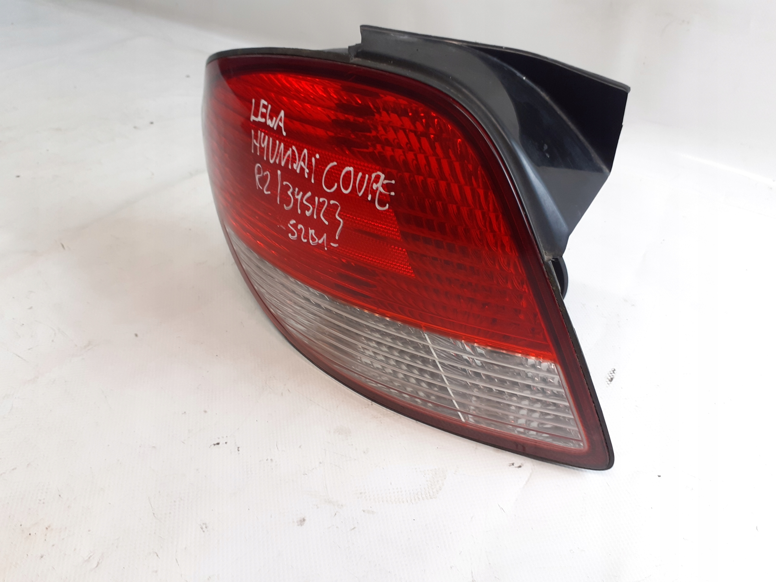 Hyundai Coupe light rear part left