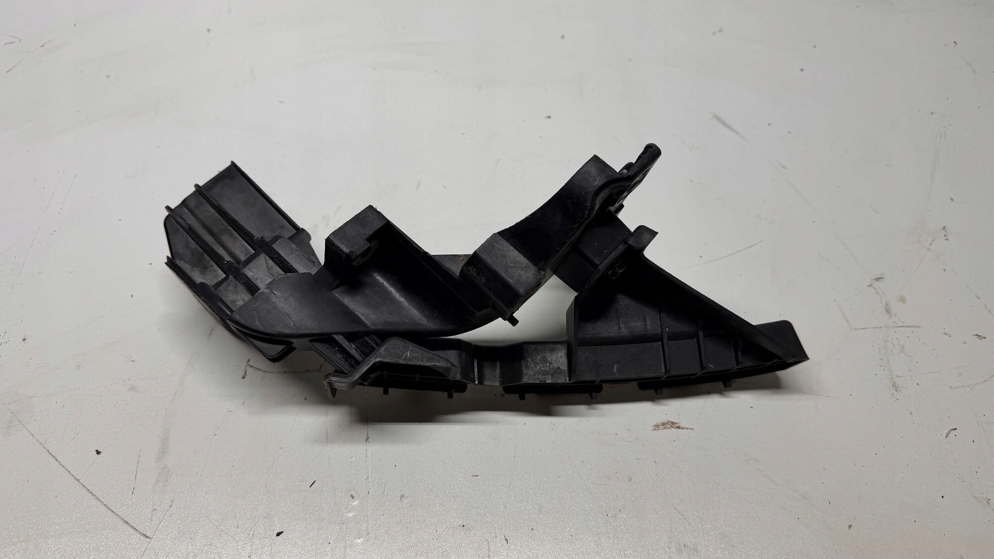 KIA CEED II OKULAR console bumper bracket supports of the front left 86517-A2000