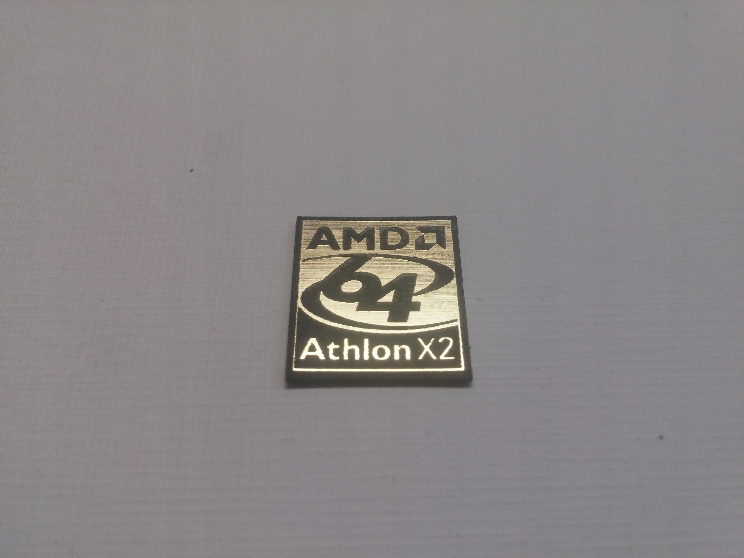 

Amd 64 Athlon naklejka emblemat 19 x 17 mm*ZŁOTA
