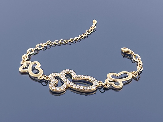 

Złota bransoletka Charms