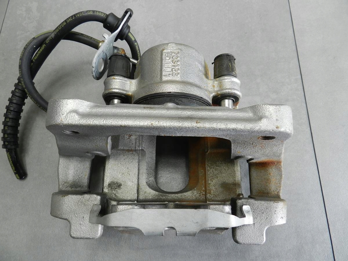 BMW X4 F26 caliper right front 703123
