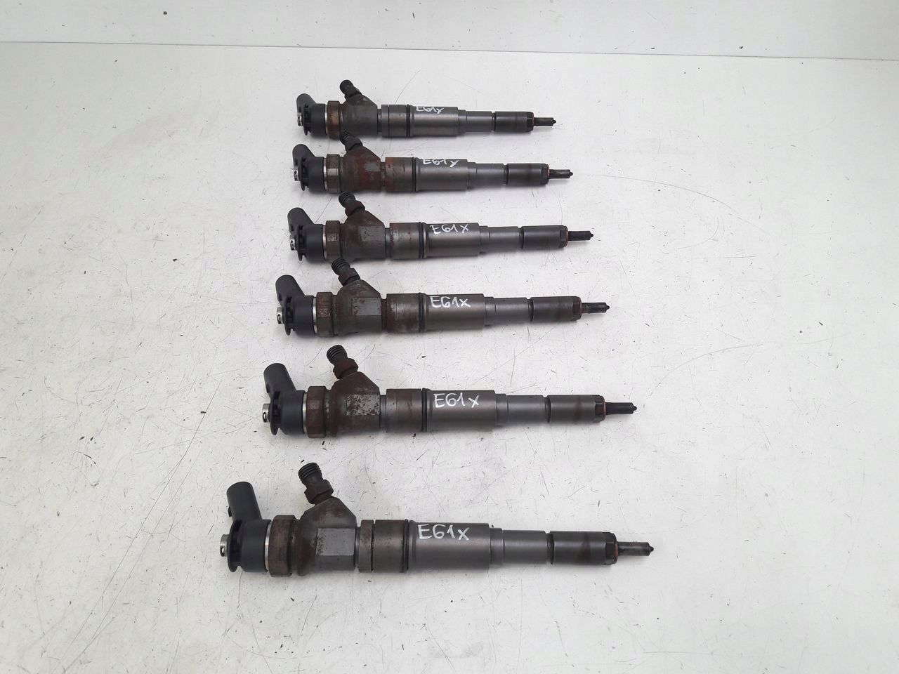 vstřikovač BMW E61 E60 3,0D 7794435