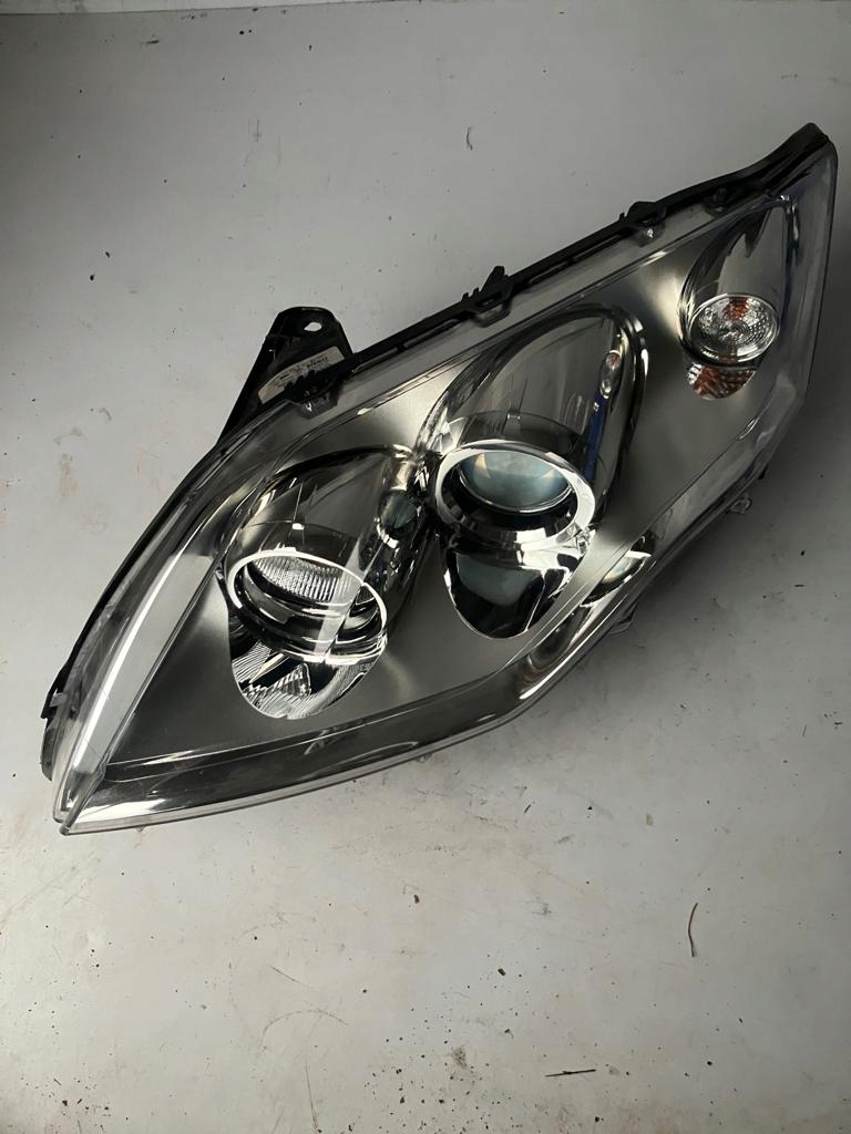 light left front RENAULT LAGUNA III lens 260600038R