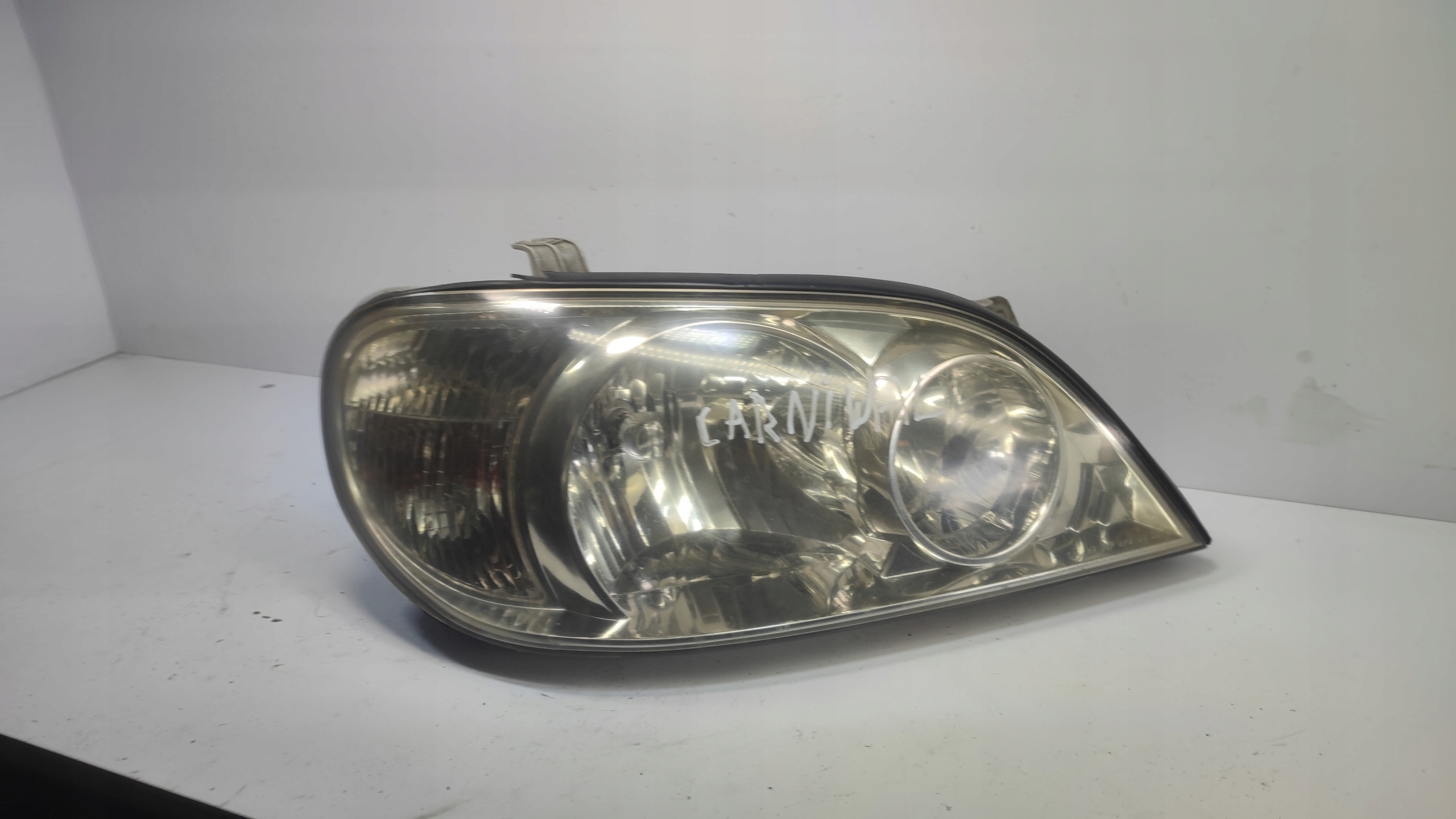LAMPA PRAWA PRZEDNIA KIA CARNIVAL I