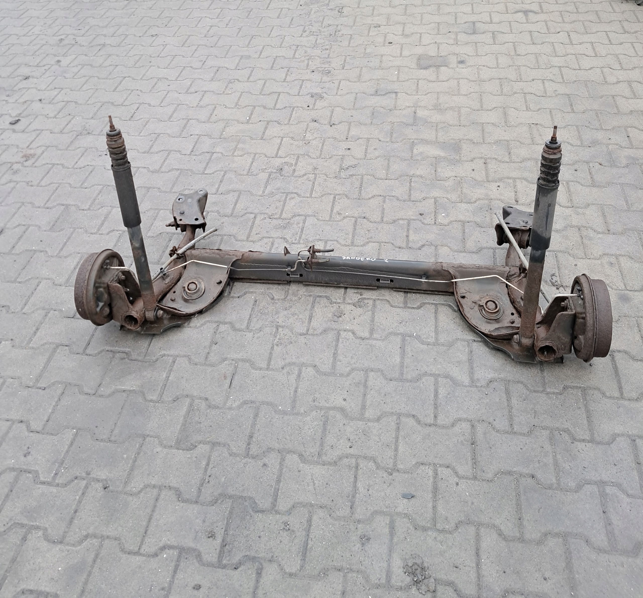 BELKA ZAWIESZENIA TYŁ DACIA SANDERO STEPWAY II