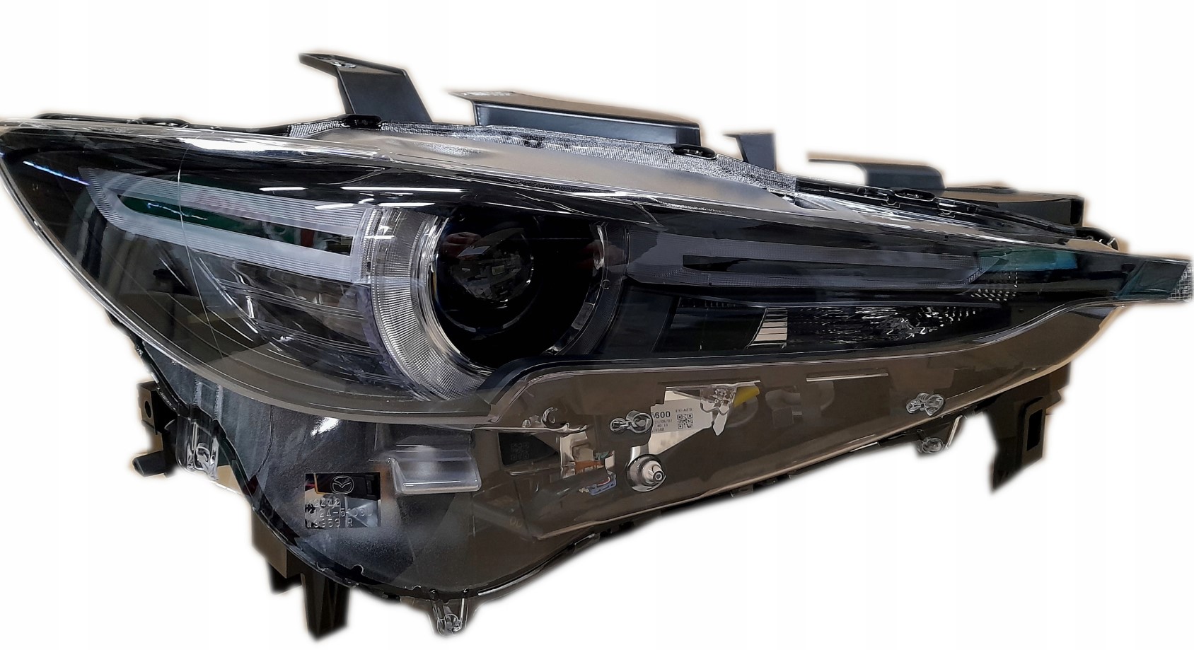 Reflektor Mazda OE KB8P-51-031H