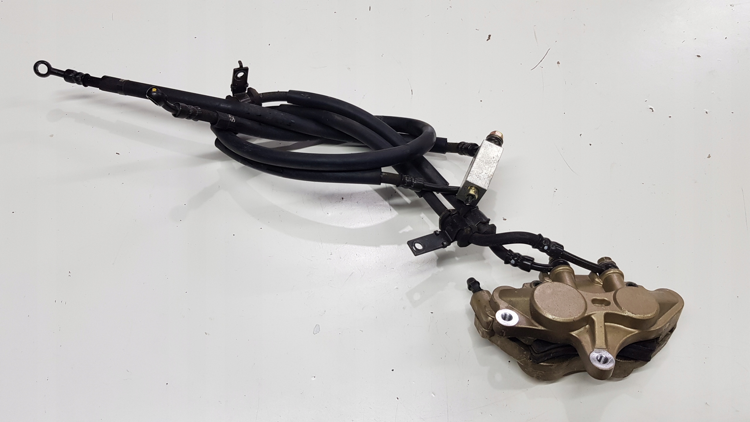 DAELIM S2 FI 125 передній гальмівний супорт