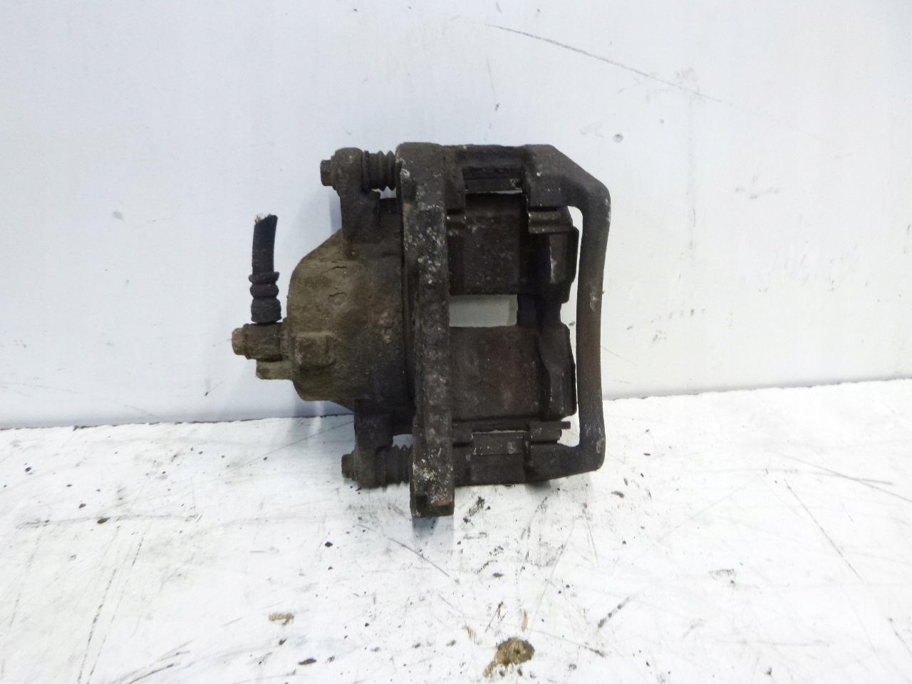 caliper brake front right Nissan Primera P12 1.8 02-07r.