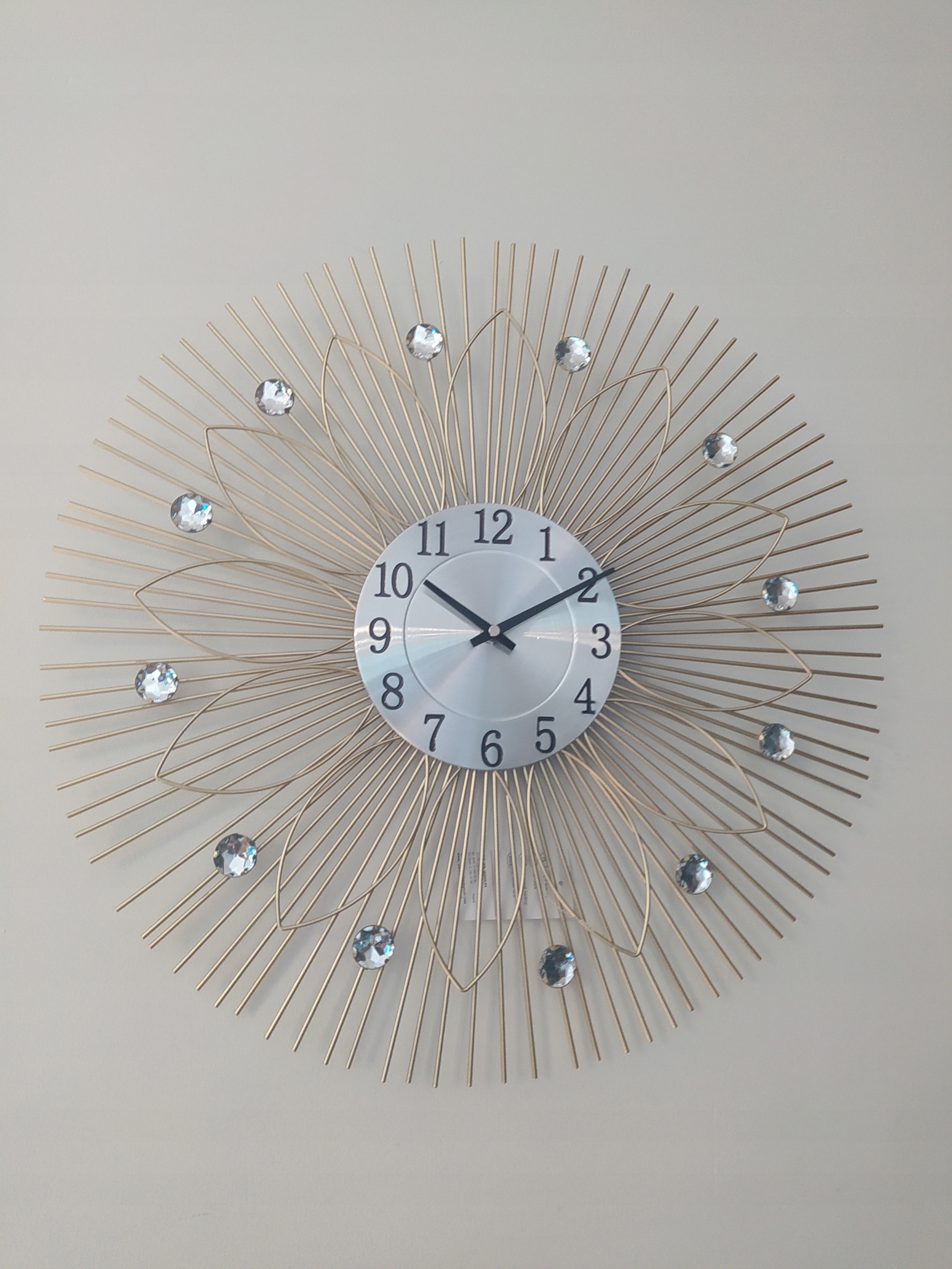 

Zegar ścienny oris kwiat złoty 50cm