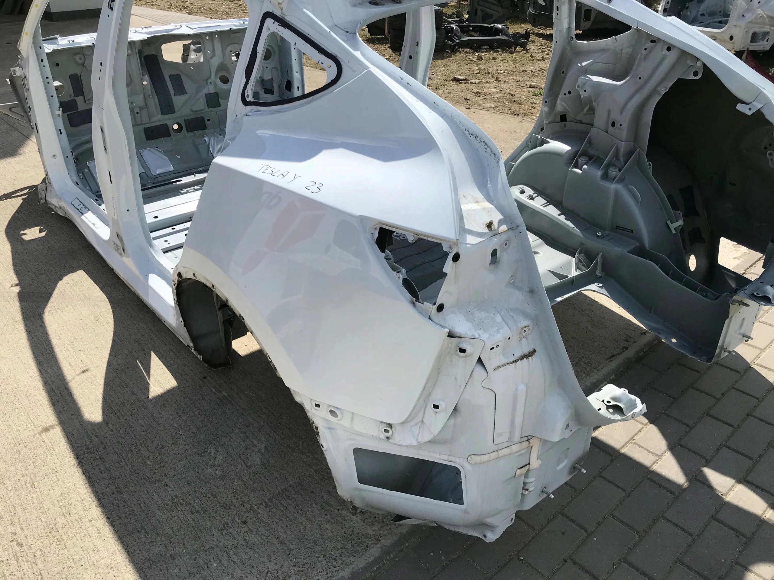 TESLA MODEL Y 2022 2023 ĆWIARTKA BŁOTNIK TYŁ TYLNA LEWA BIAŁA