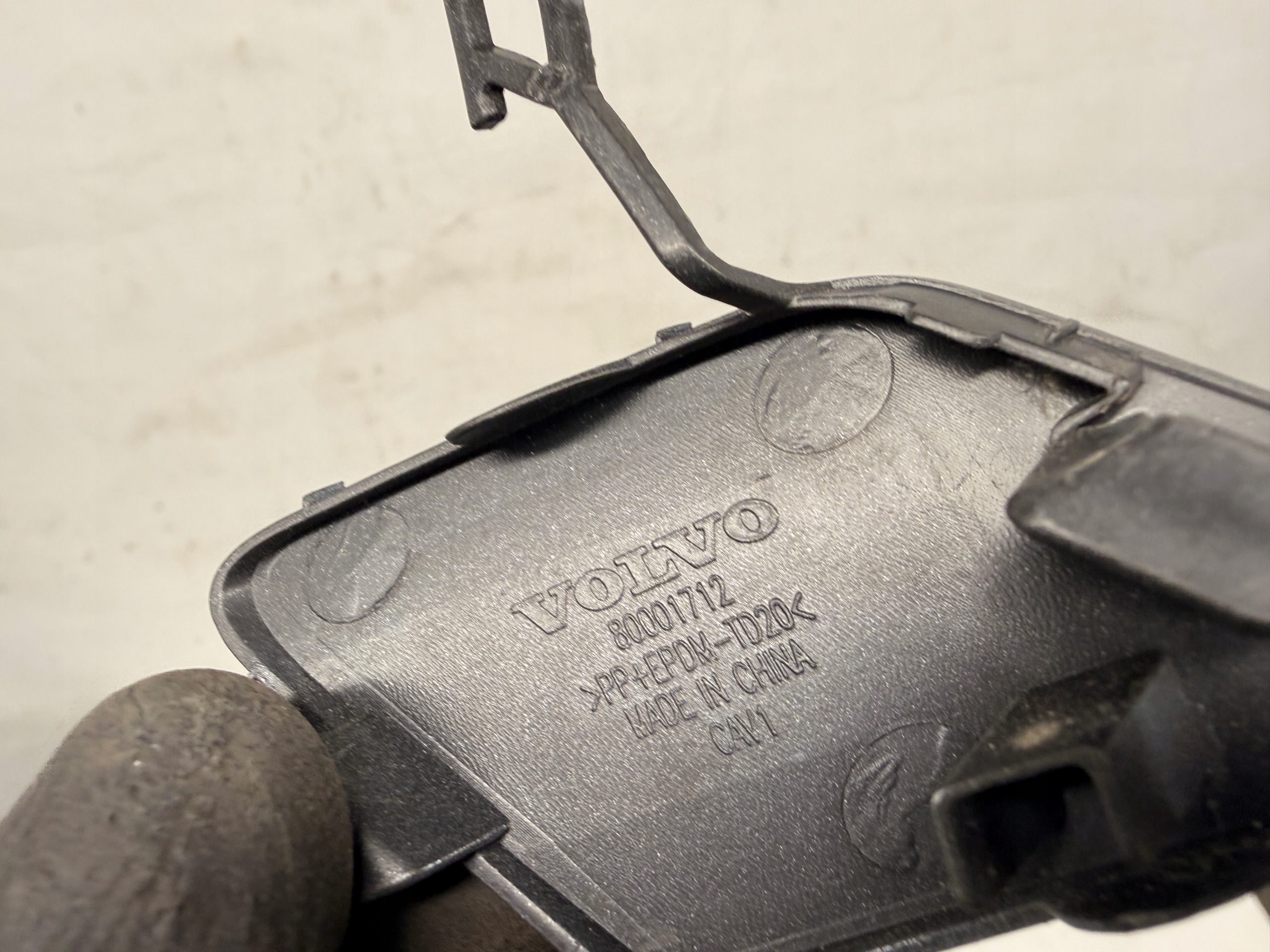 Volvo EX30 towing hook cap of a bumper front front 80001712