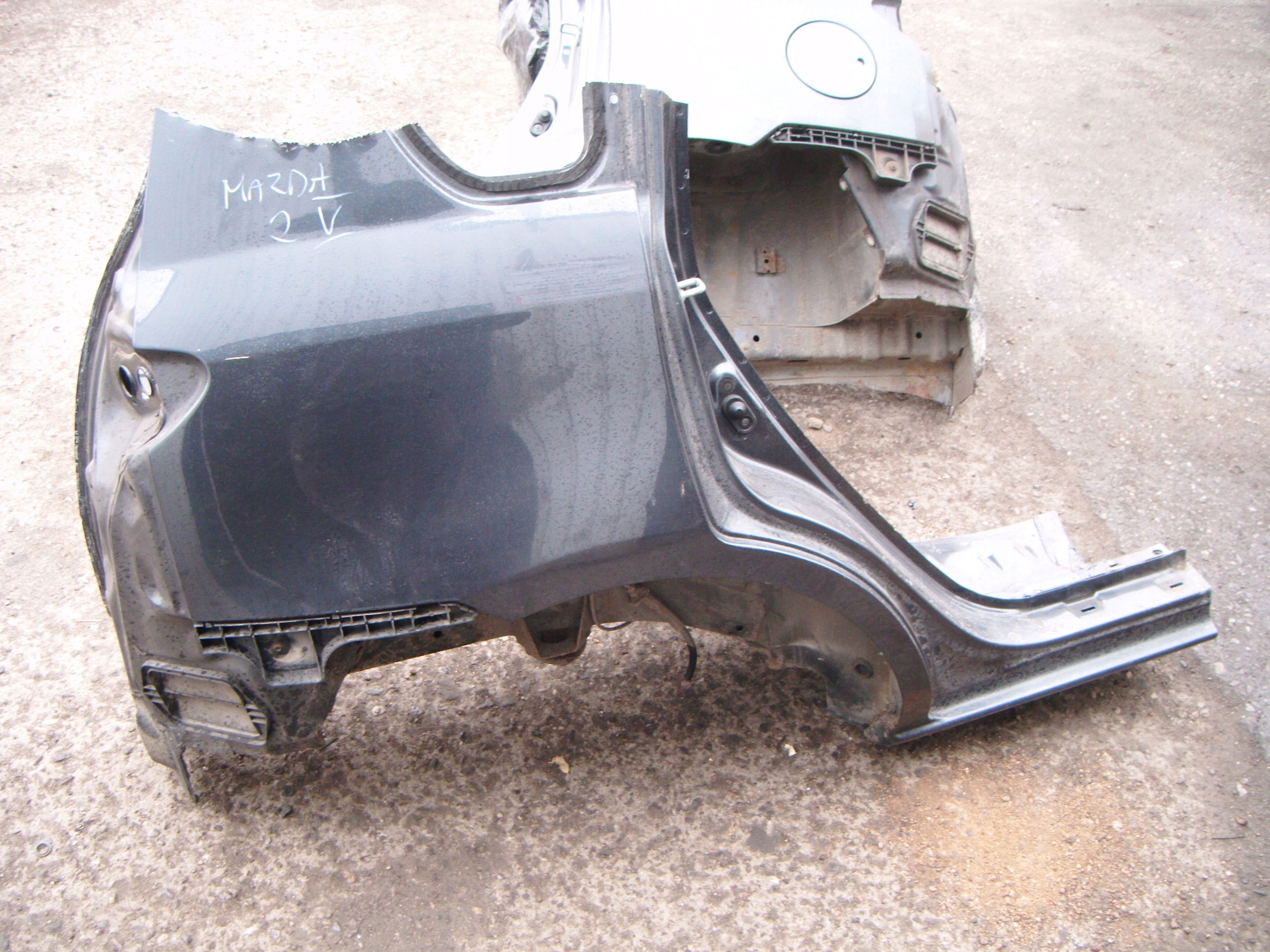 MAZDA 2 II 02-07 BŁOTNIK ĆWIARTKA PRAWY TYŁ