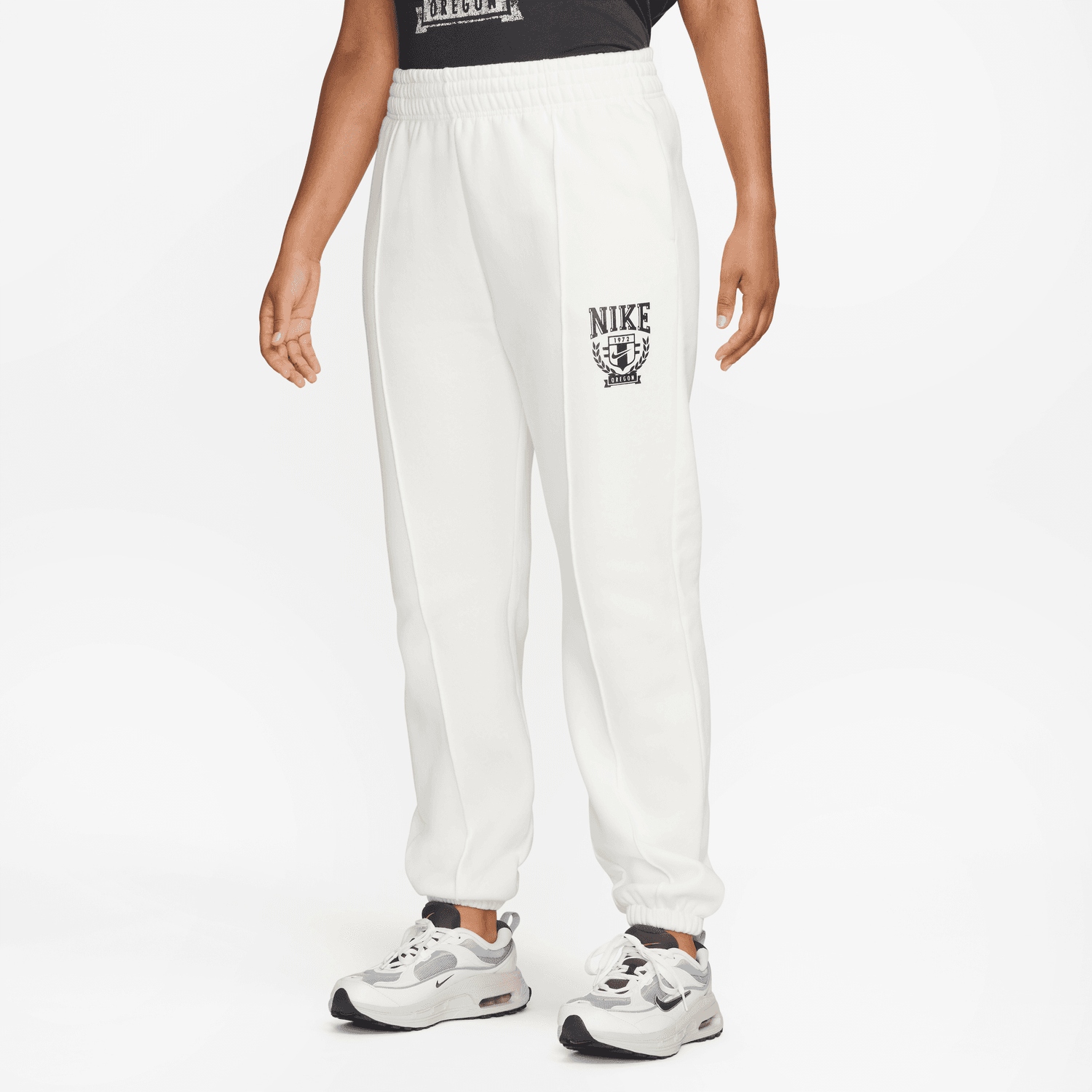 Fleecové teplákové kalhoty Nike FZ0229-133 vel. L