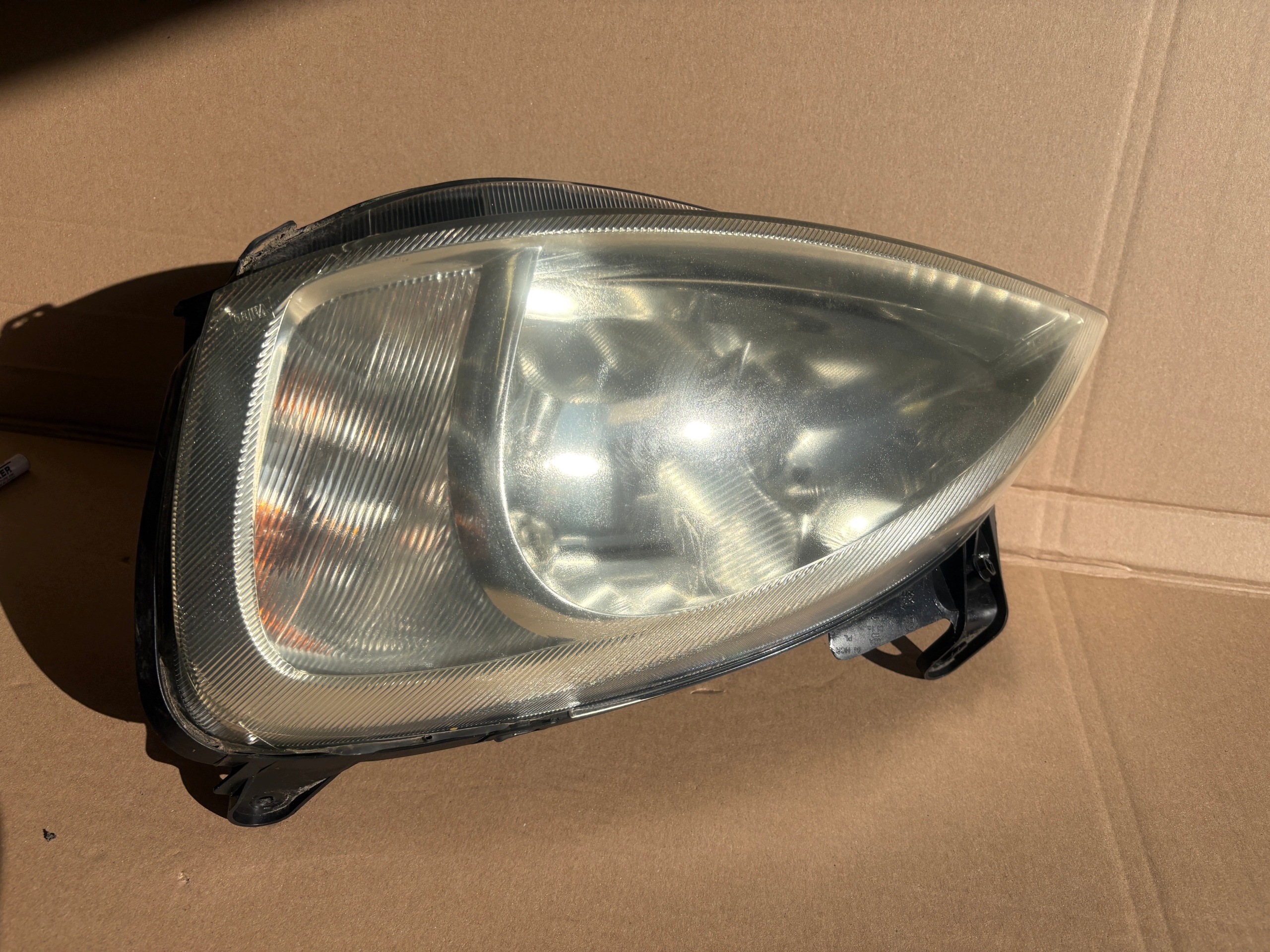 OPEL CORSA C feu droite avant 09114330