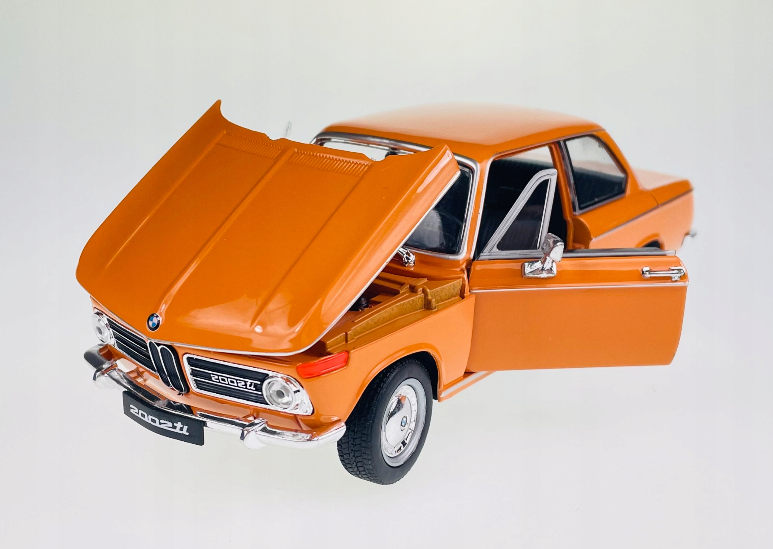 

Welly Bmw 2002ti Pomarańczowy 1:24 Nowy Metalowy