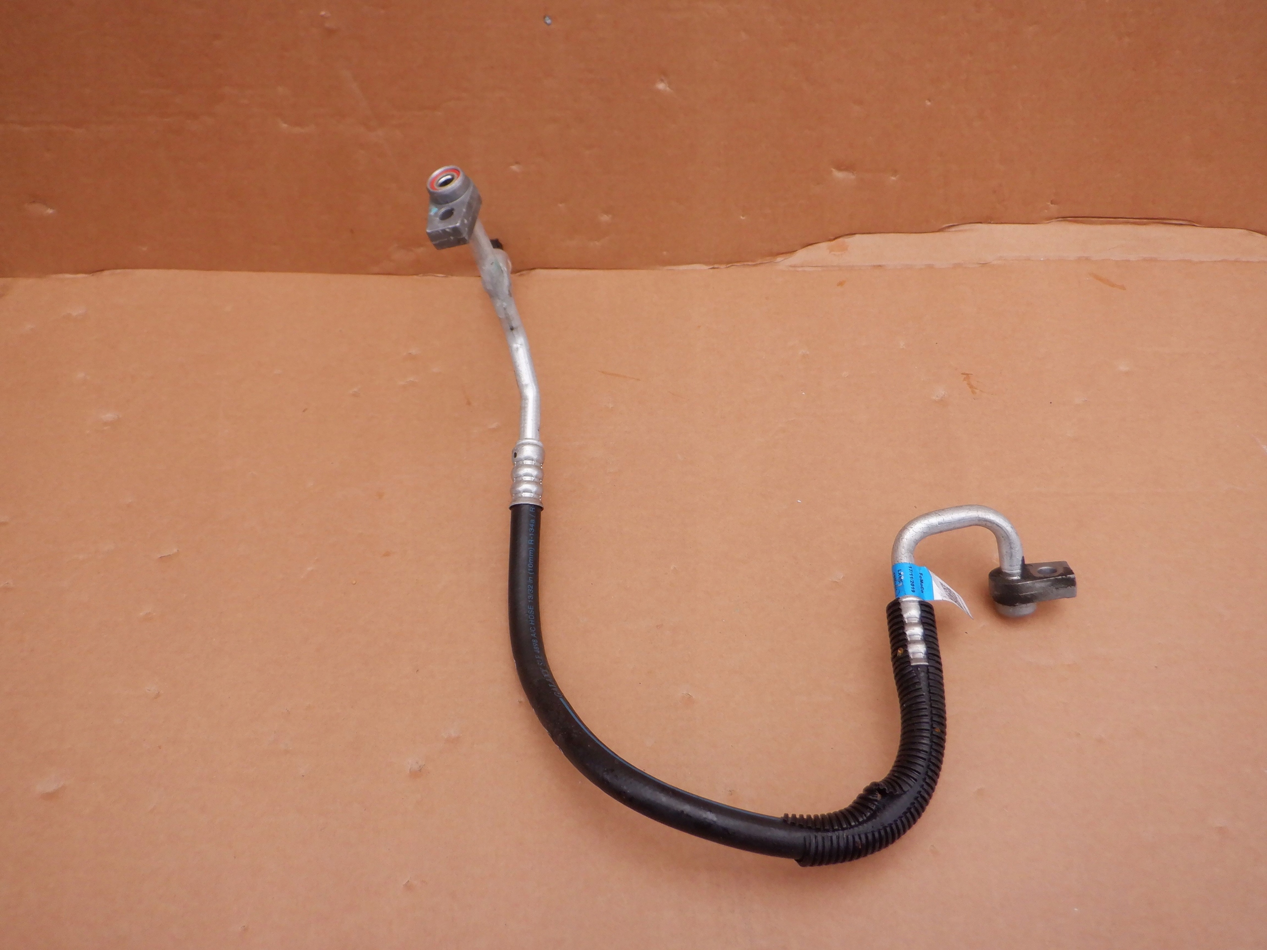 LX6H-19N601-CC - КАБЕЛЬ КОНДИЦИОНЕРА FORD ESCAPE MK4 2020-1.5 EB