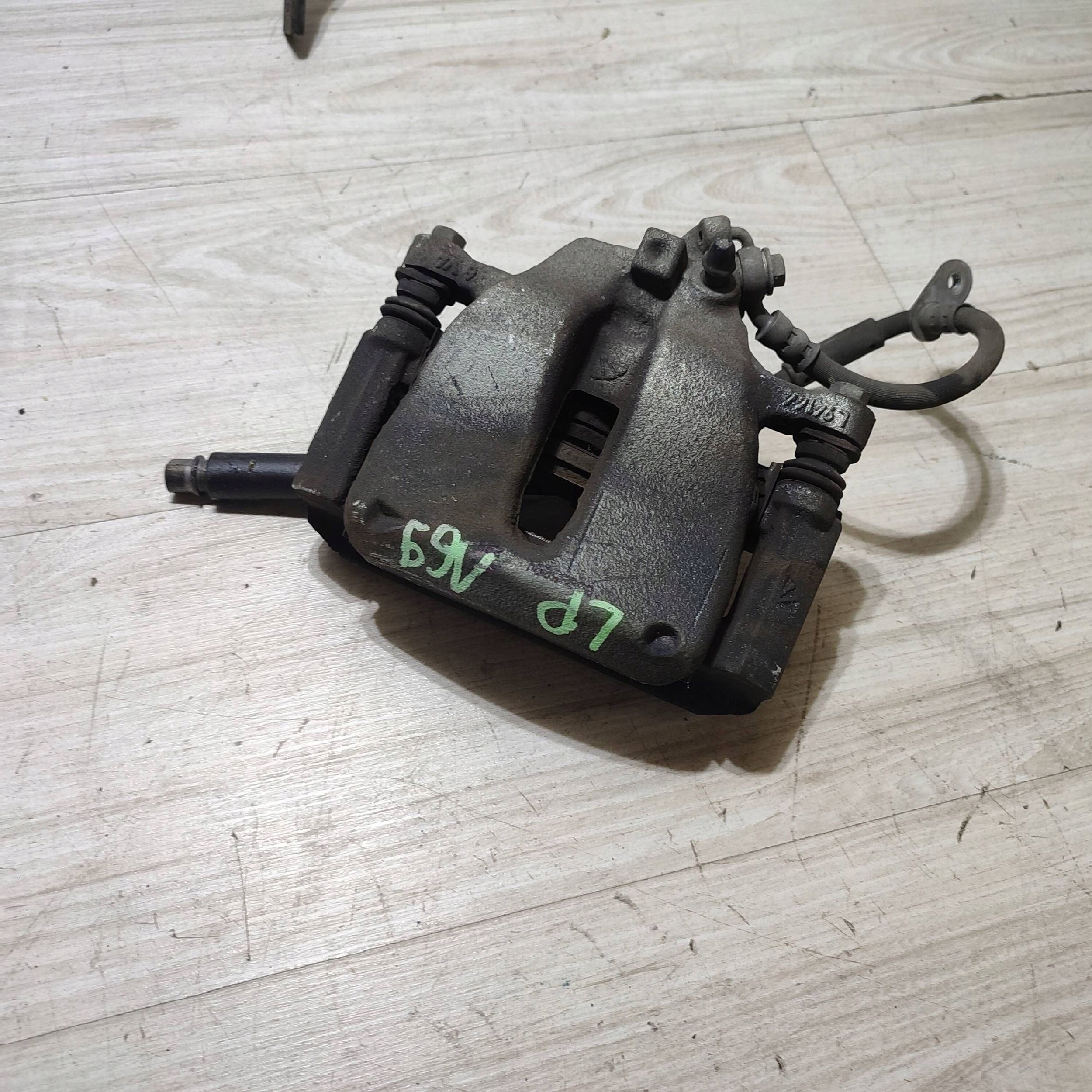 caliper brake front front side left Opel Corsa F 9824176680