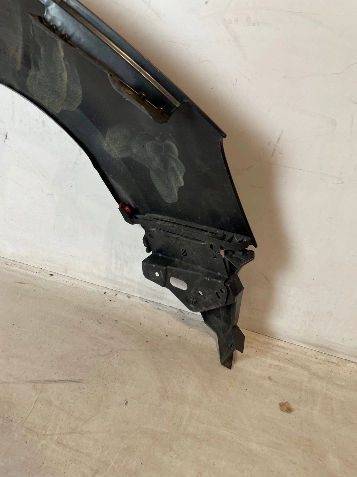 fender front front left Opel Astra IV J black