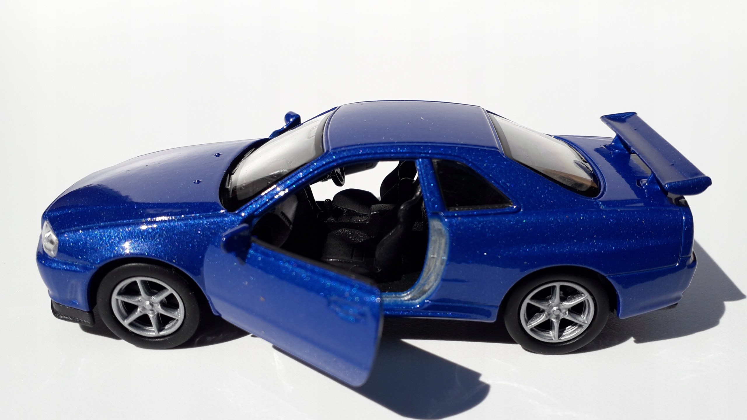 Nissan Skyline GT-R(R34) Niebieski Metalowy Model WELLY 1:34 Kod producenta 000004065