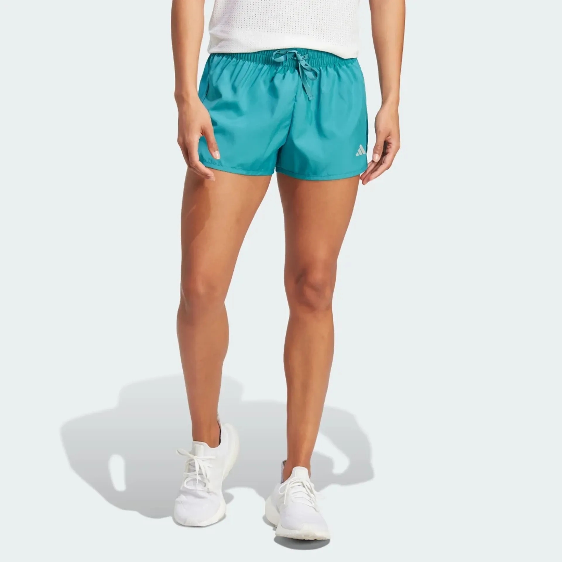 Dámske bežecké šortky kraťasy Adidas Run It Hy 6965 tyrkysové modré L