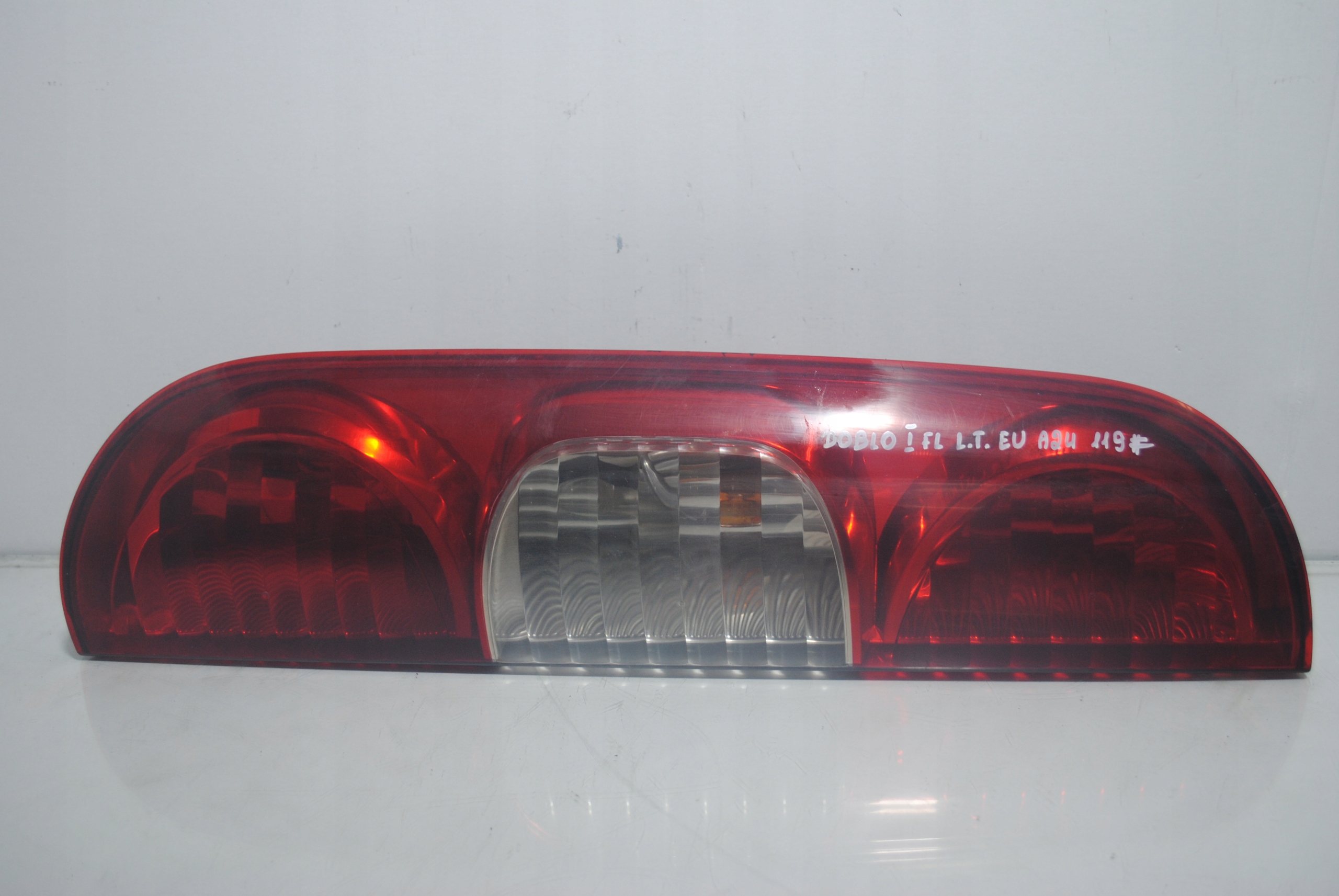 фонарь левый FIAT Doblo I FL европа