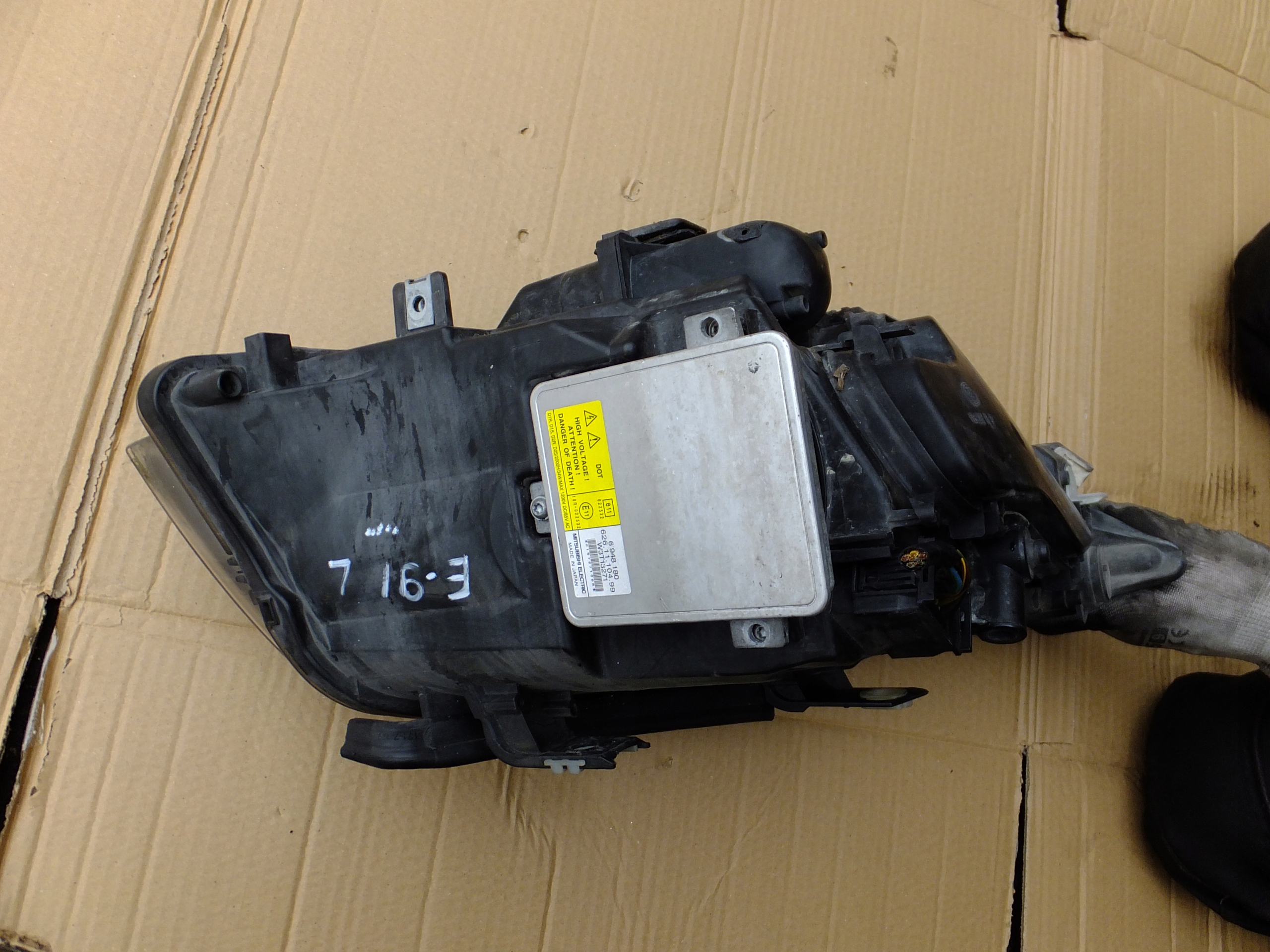 light xenon positioning left front bmw e90 e91 2007r 6942743