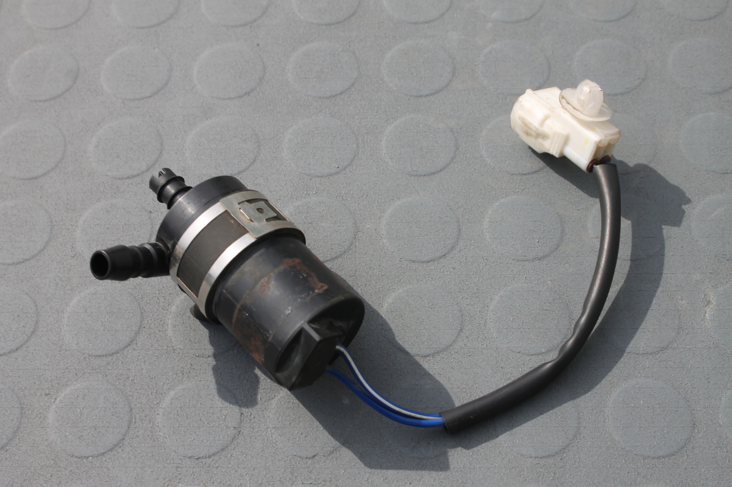 11958 - НАСОС ОМЫВАТЕЛЯ КСЕНОНА SUBARU FORESTER III 08-