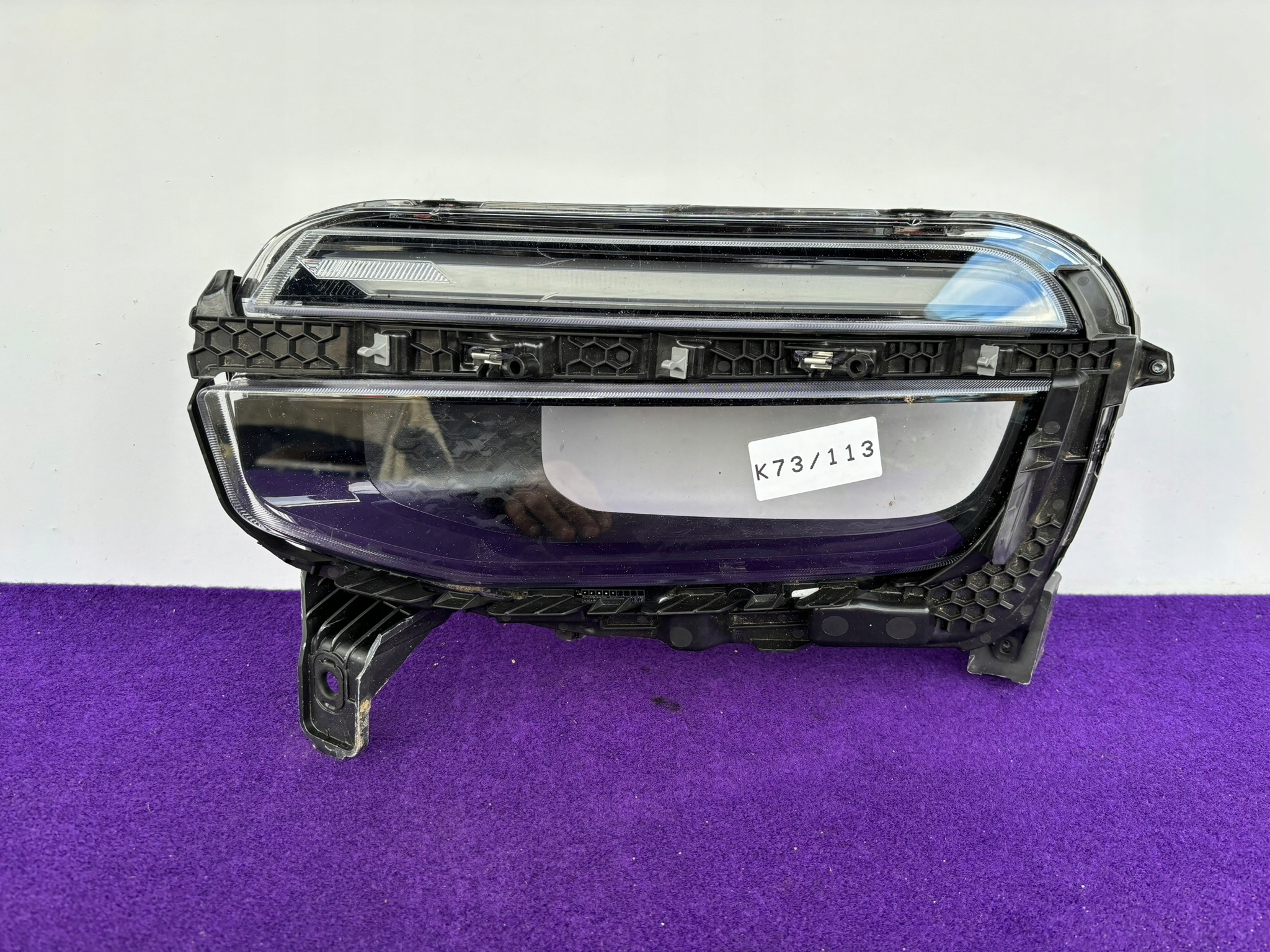 JEEP AVENGER left light front KLOSZ SZKLO bracket L708258 K73/113