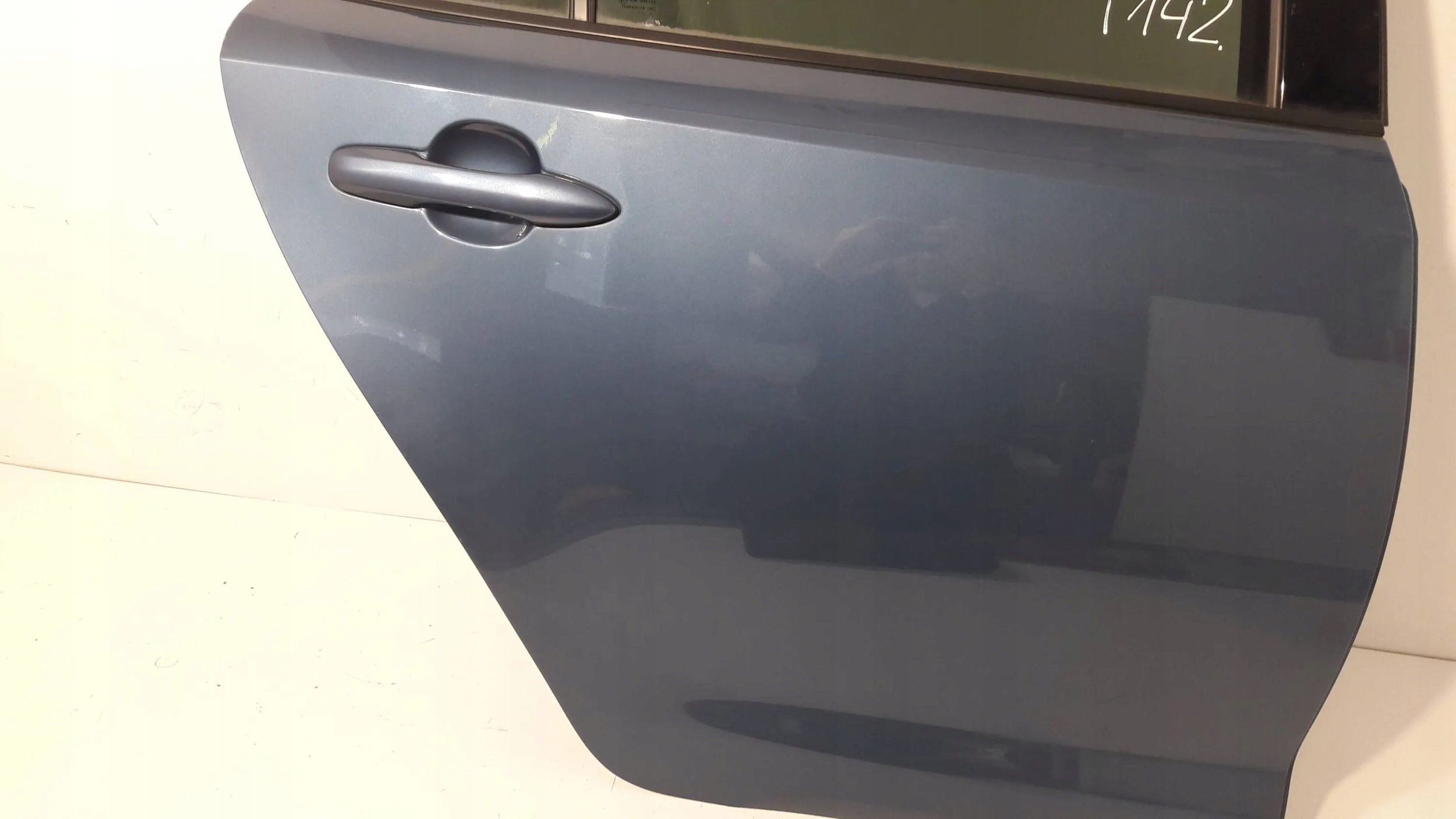 Toyota Corolla E210 E21 door rear.