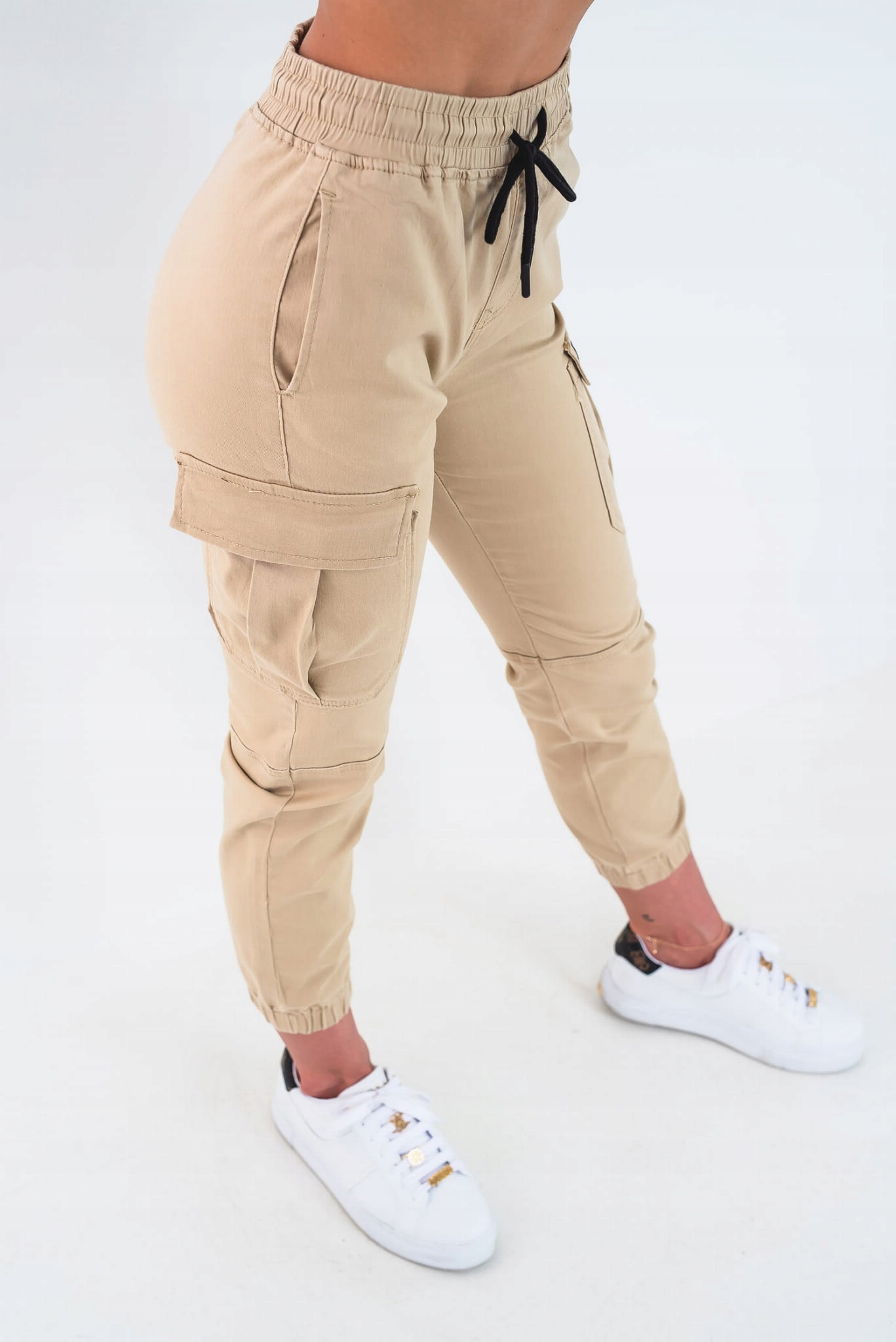Damskie beżowe spodnie bojówki z kieszeniami CARGO ze ściągaczami L Płeć kobieta