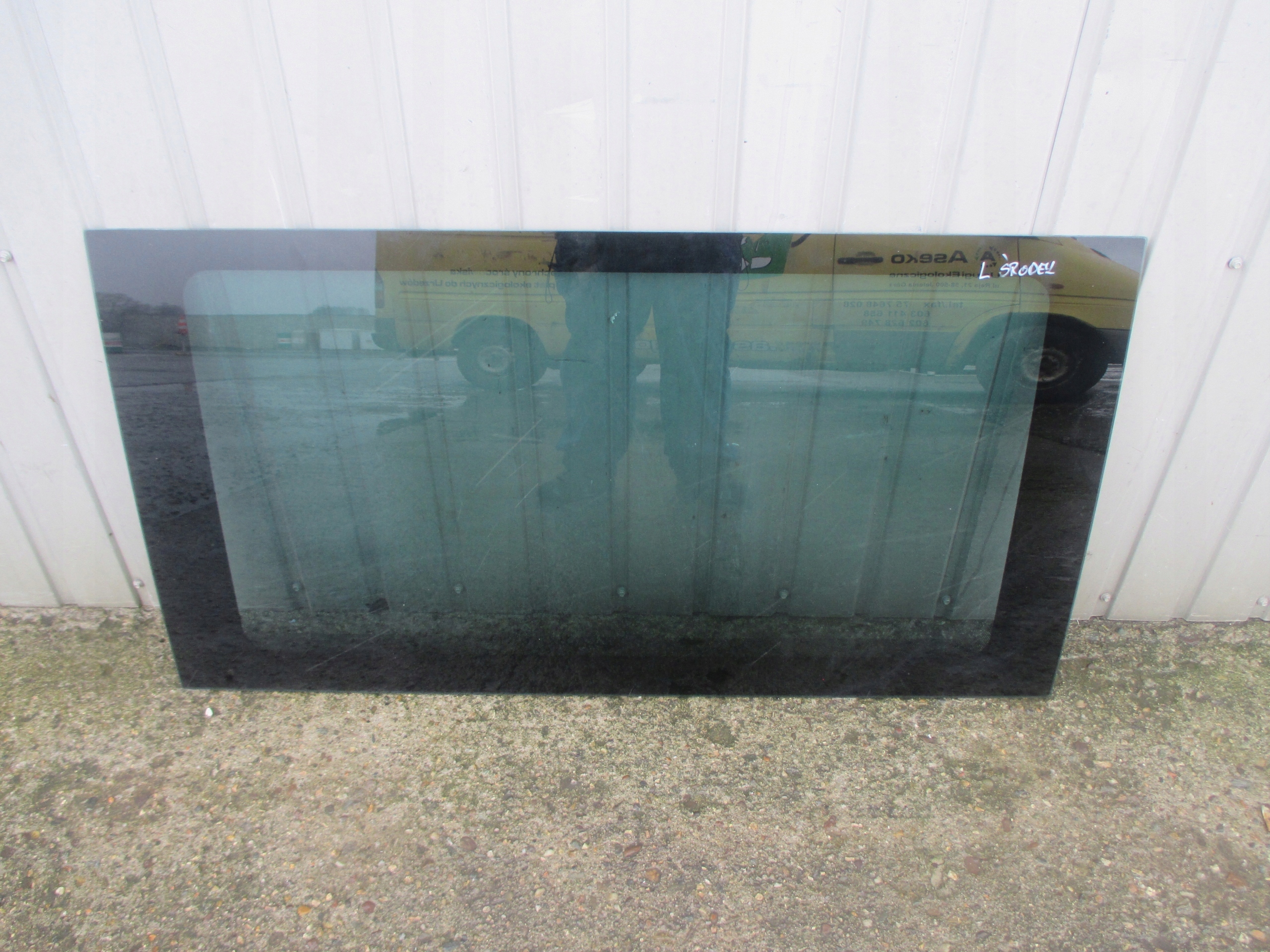 FORD TRANSIT MK 5 SZYBA KAROSERYJNA LEWA ŚRODKOWA