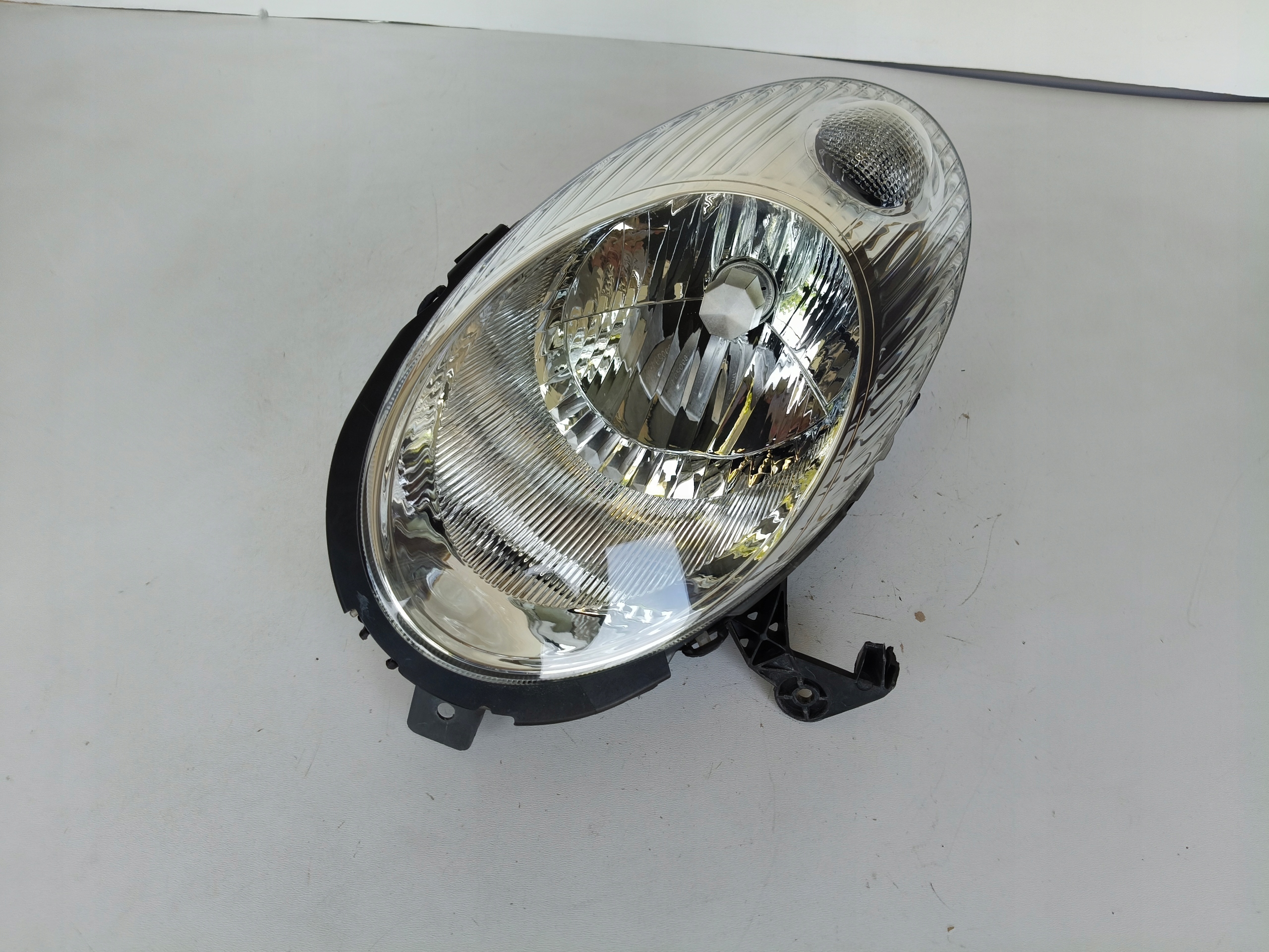 light left REFLEKTOR NISSAN MICRA K12 02