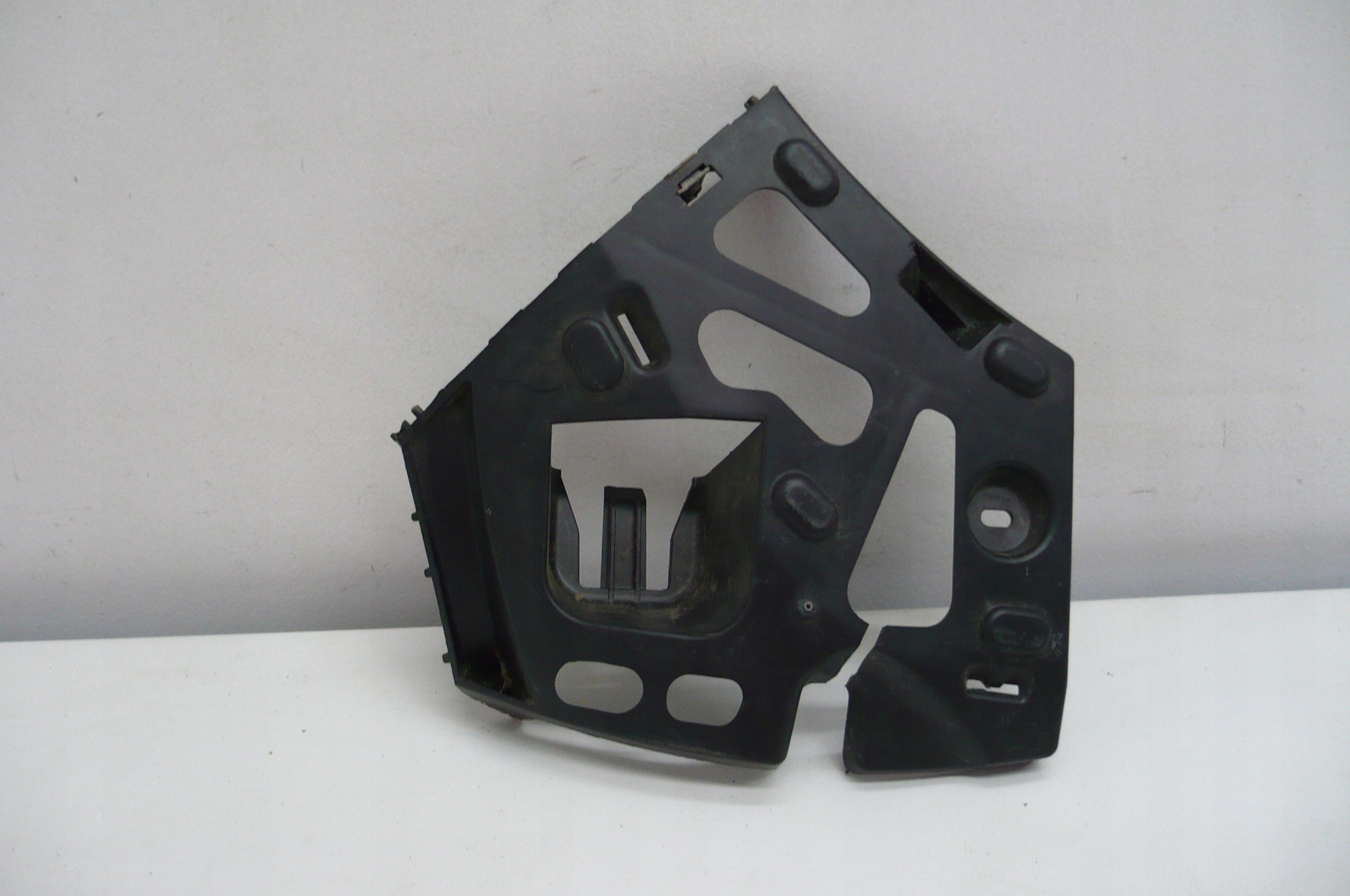 PEUGEOT 207 holder bumper bracket left front 06-12