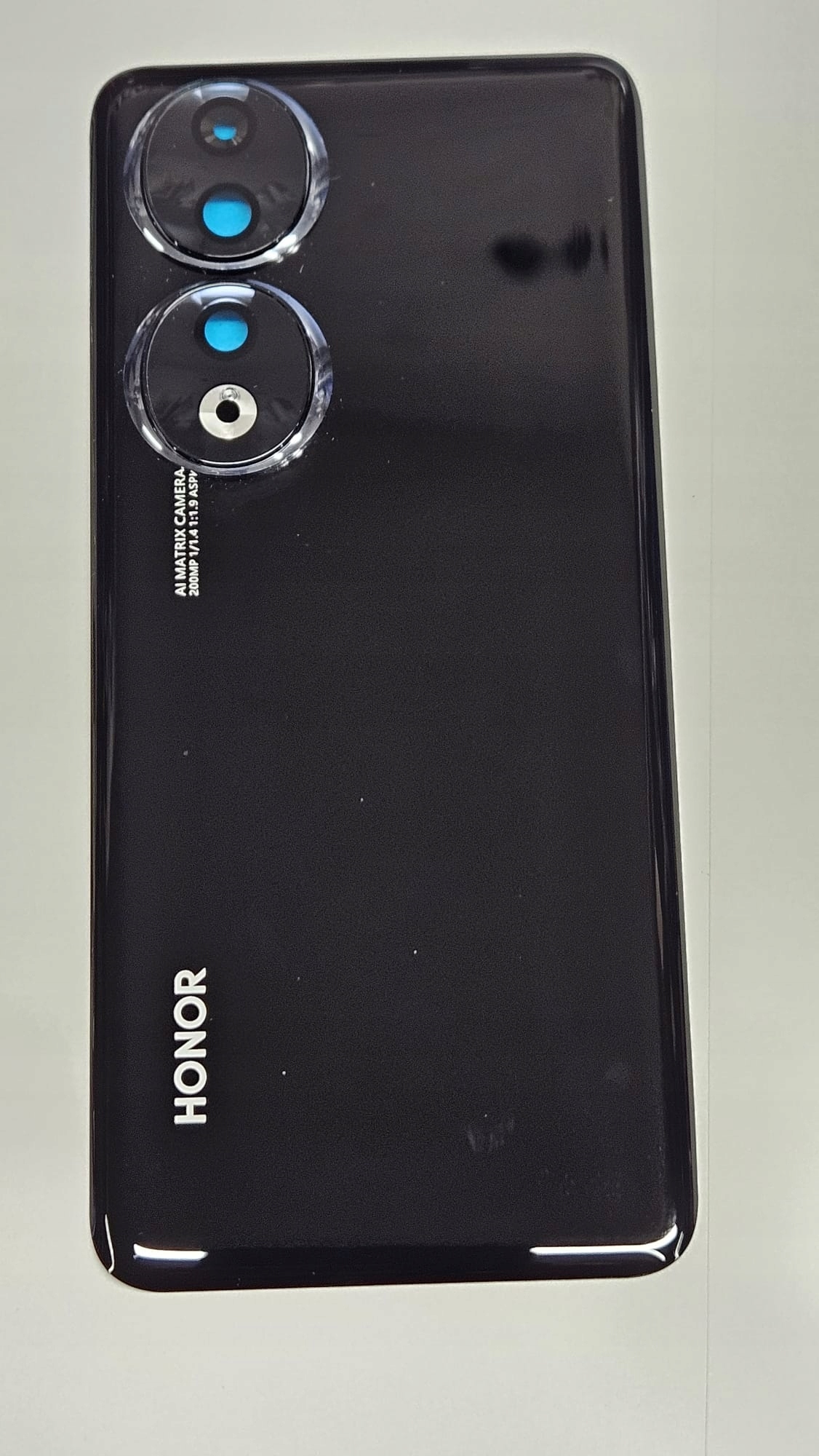 Klapka baterii , tył Honor 90 czarny z szybką kamery i taśmą montażową