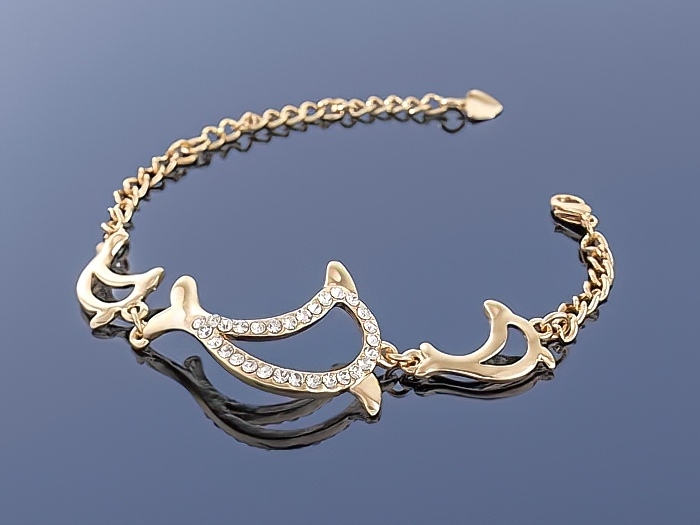 

Złota bransoletka Charms
