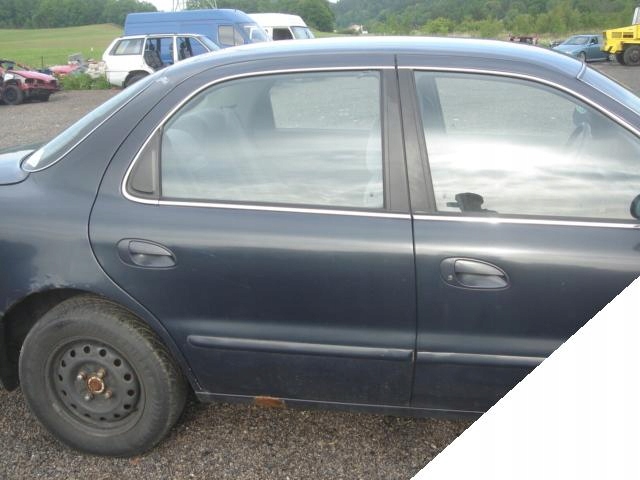 KIA CLARUS 1 i 2 95-01 ZAMEK PRAWY TYLNY