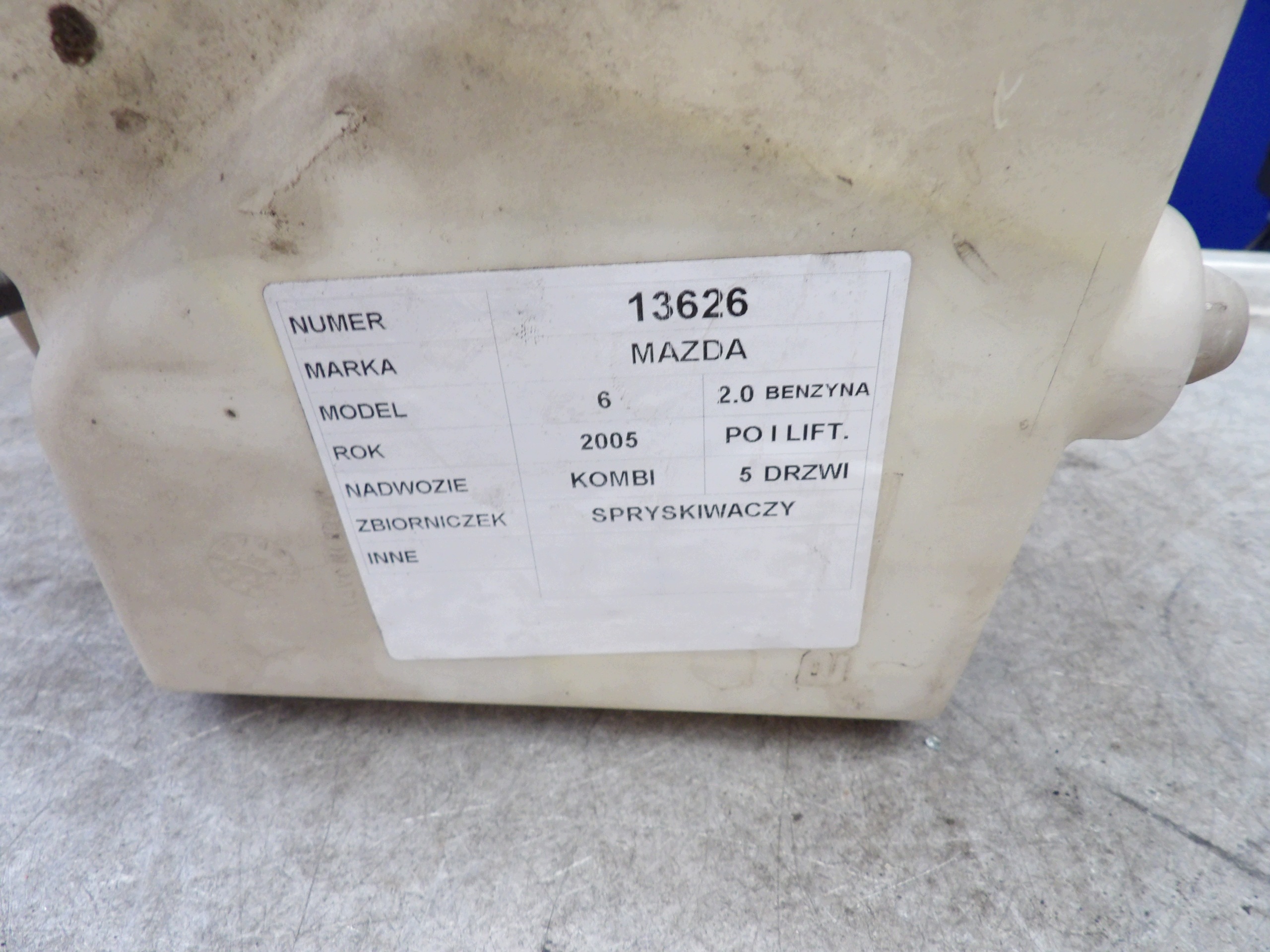 Mazda 6 and lift washer fluid tank