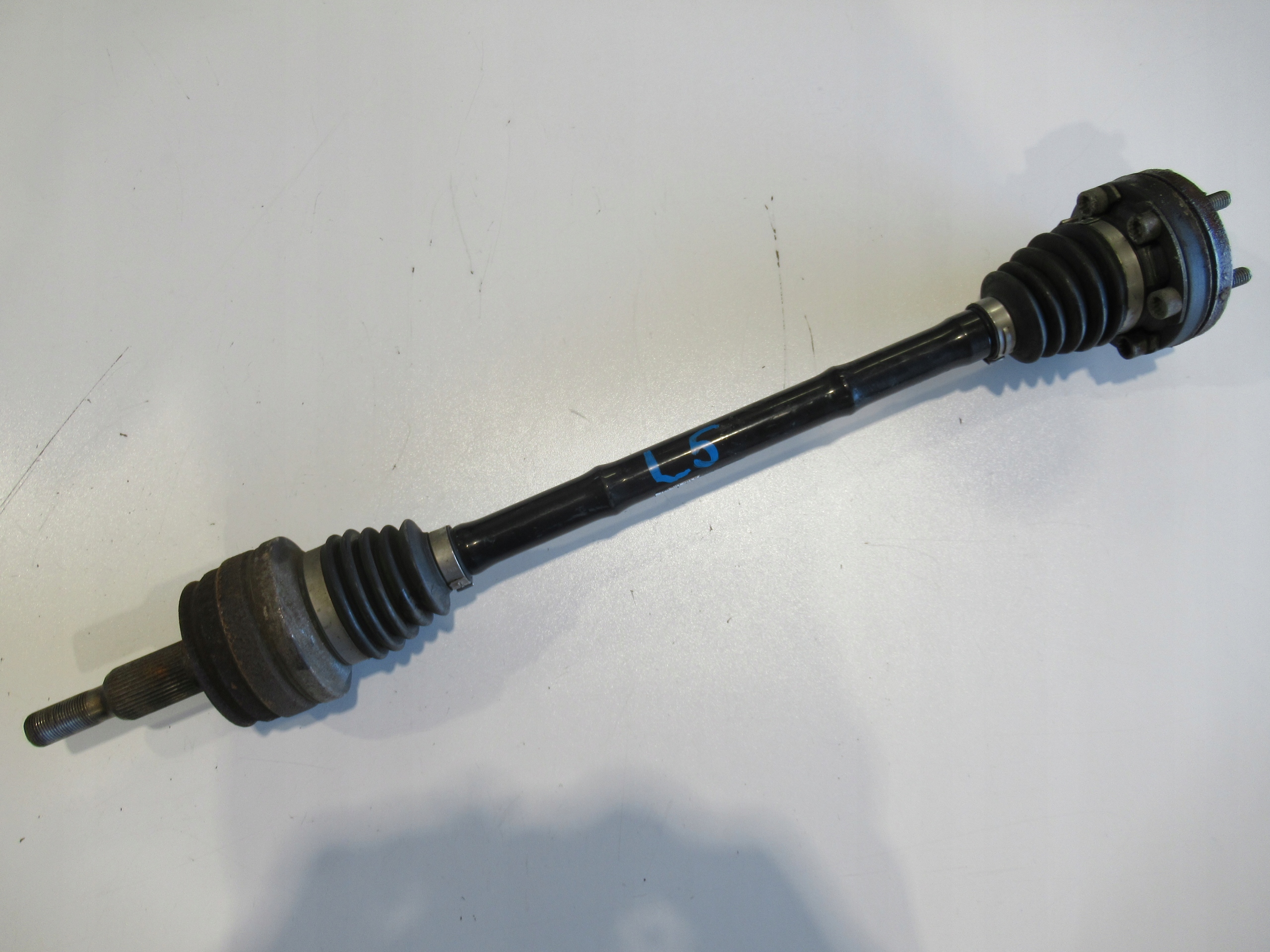 VW T5 LIFT 2.0 TDI semi-axis left left rear part 7E0501201B