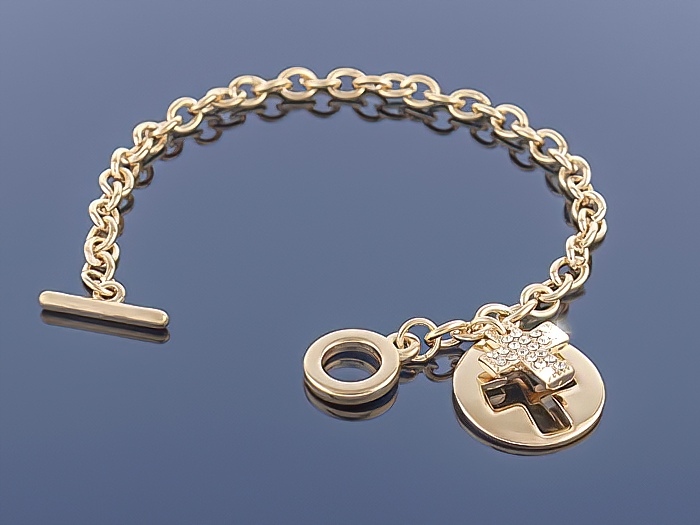

Złota bransoletka Charms