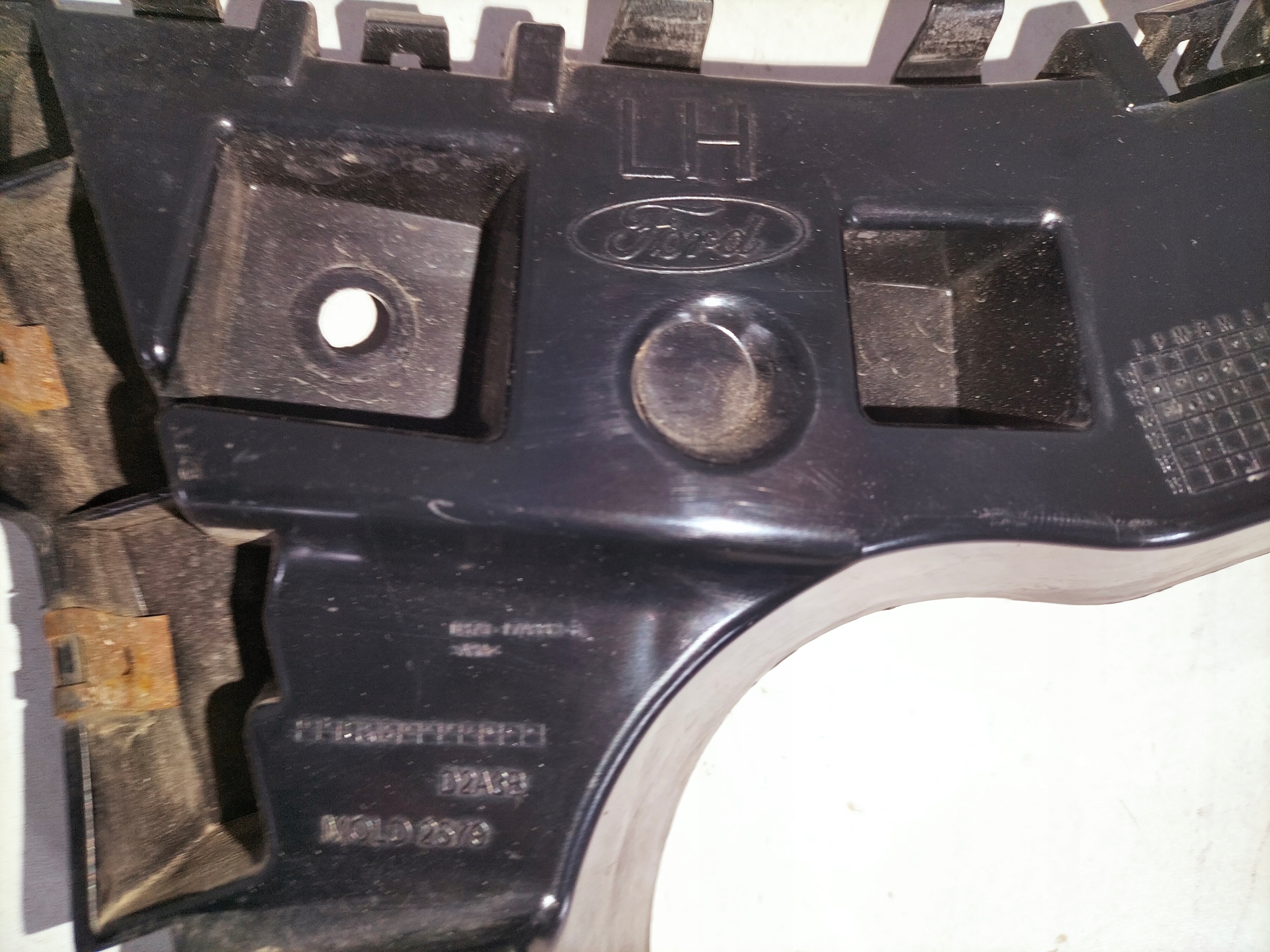 bumper bracket rear part left FORD MONDEO MK5 14- SDN HB